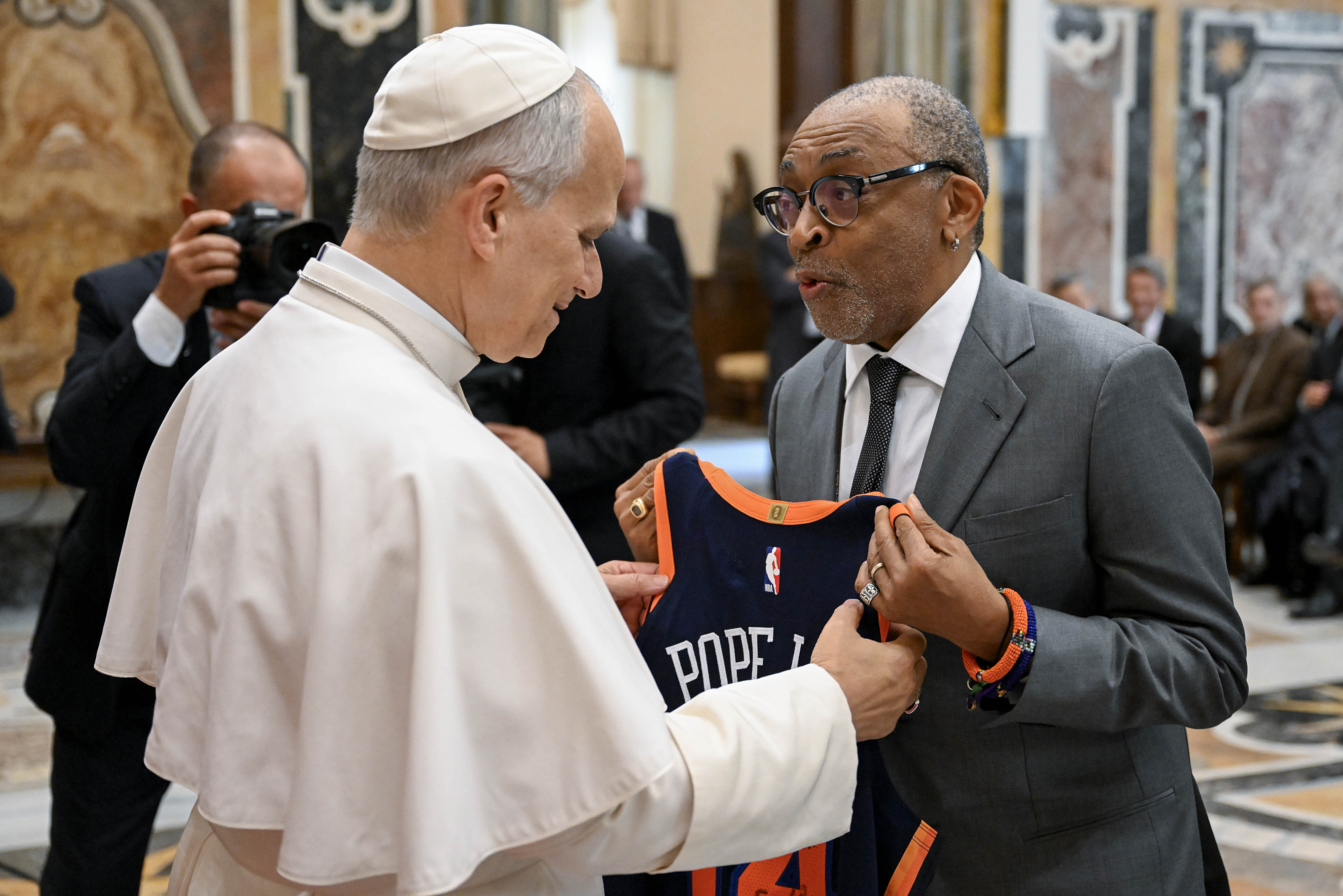 Pope Leo XIV greets Spike Lee during an audience with the Film Industry at the Clementine Hall of the Apostolic Palace on November 15, 2025 in Vatican City, Vatican. | Source: Getty Images