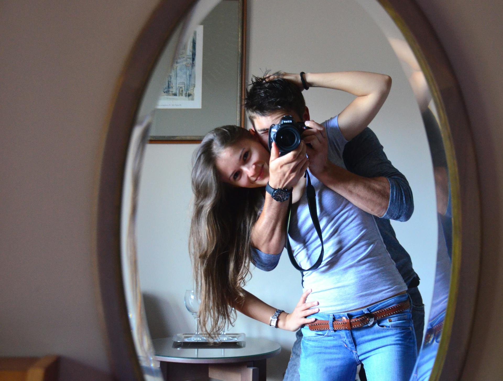 A couple taking a playful photo | Source: Pexels