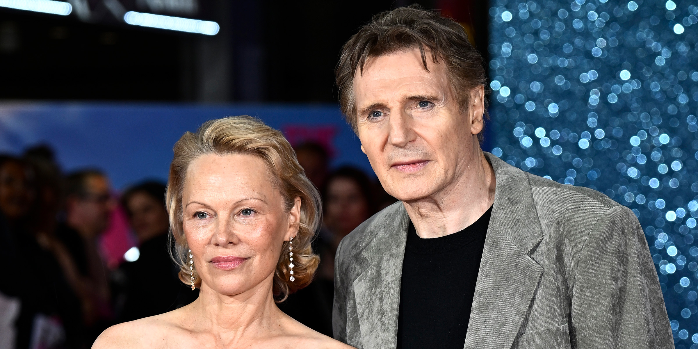 Pamela Anderson and Liam Neeson | Source: Getty Images