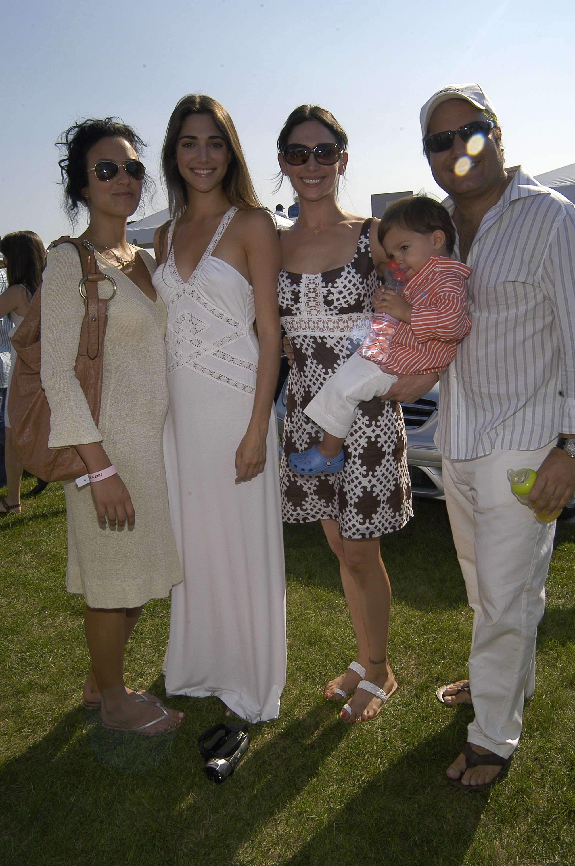 Nicole Davis (2nd L), Lauren Silverman, Adam Silverman and Andrew Silverman attend RALPH LAUREN’S BLACK WATCH TEAM AT THE MERCEDES-BENZ POLO CHALLENGE at Bridgehampton on August 11, 2007. | Source: Getty Images