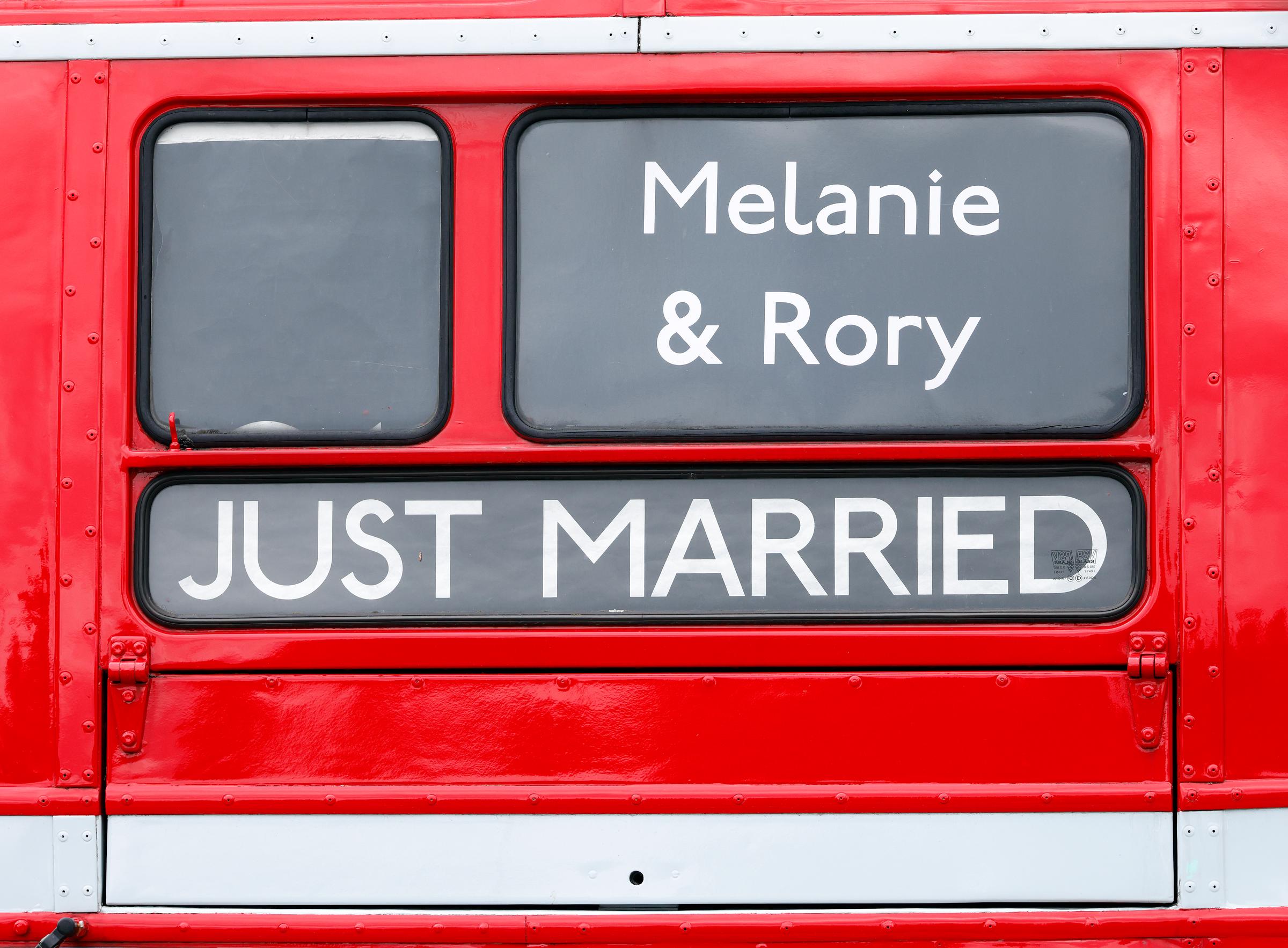 A 'Melanie & Rory - Just Married' sign on the front of a London Routemaster bus used to transport guests from Mel B and Rory McPhee's wedding at St Paul's Cathedral on July 5, 2025, in London, England. | Source: Getty Images