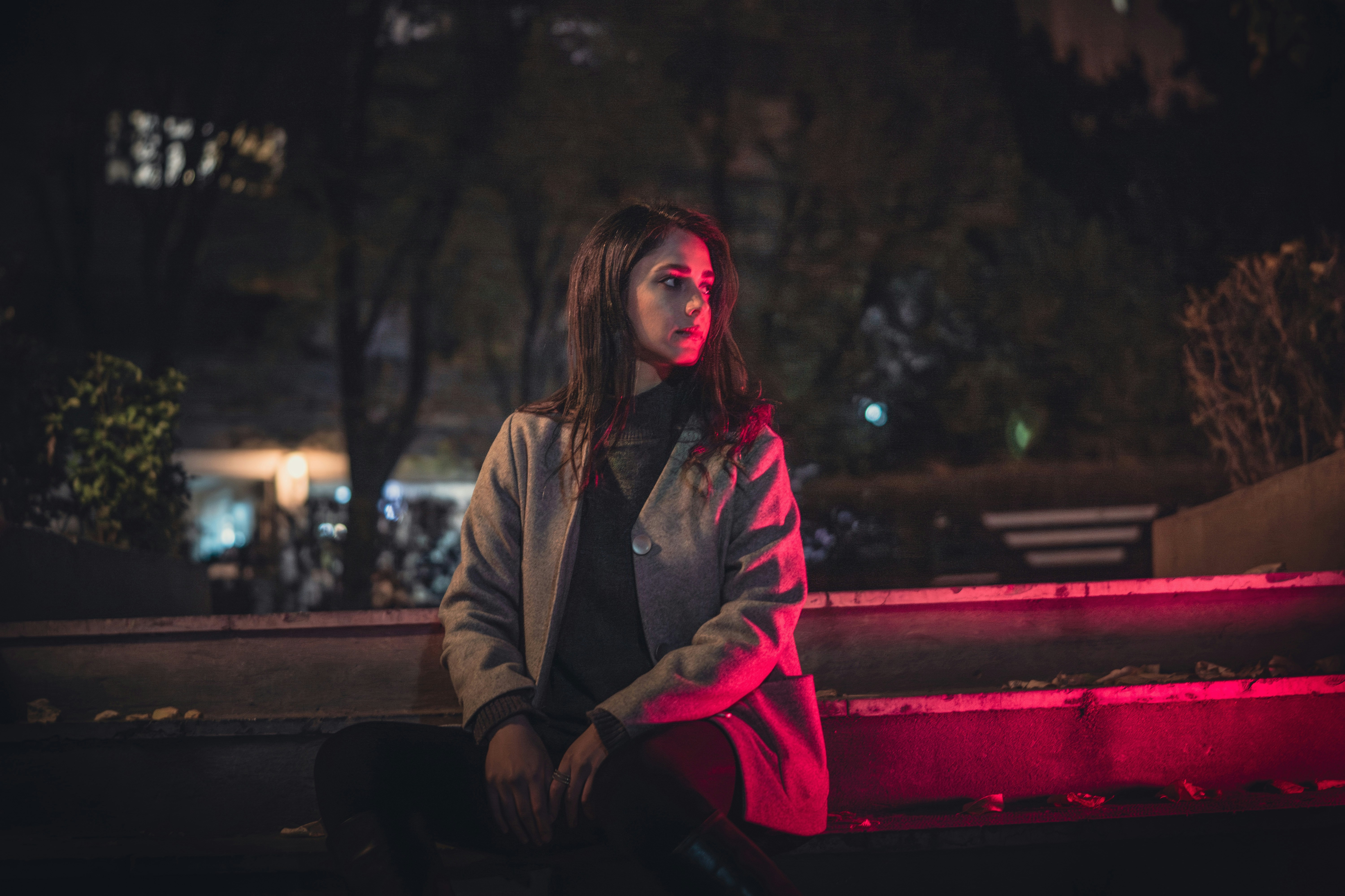 A woman sitting on a bench | Source: Unsplash
