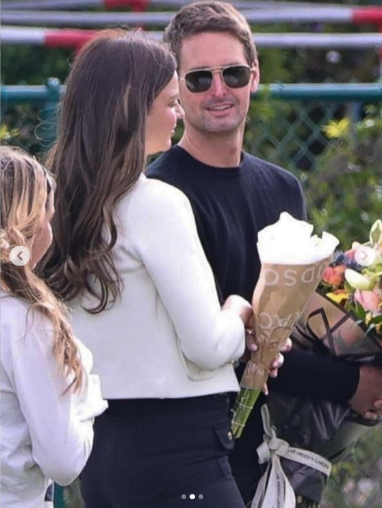 Miranda Kerr and Evan Spiegel pictured in a post dated June 8, 2025. | Source: Instagram/justjared