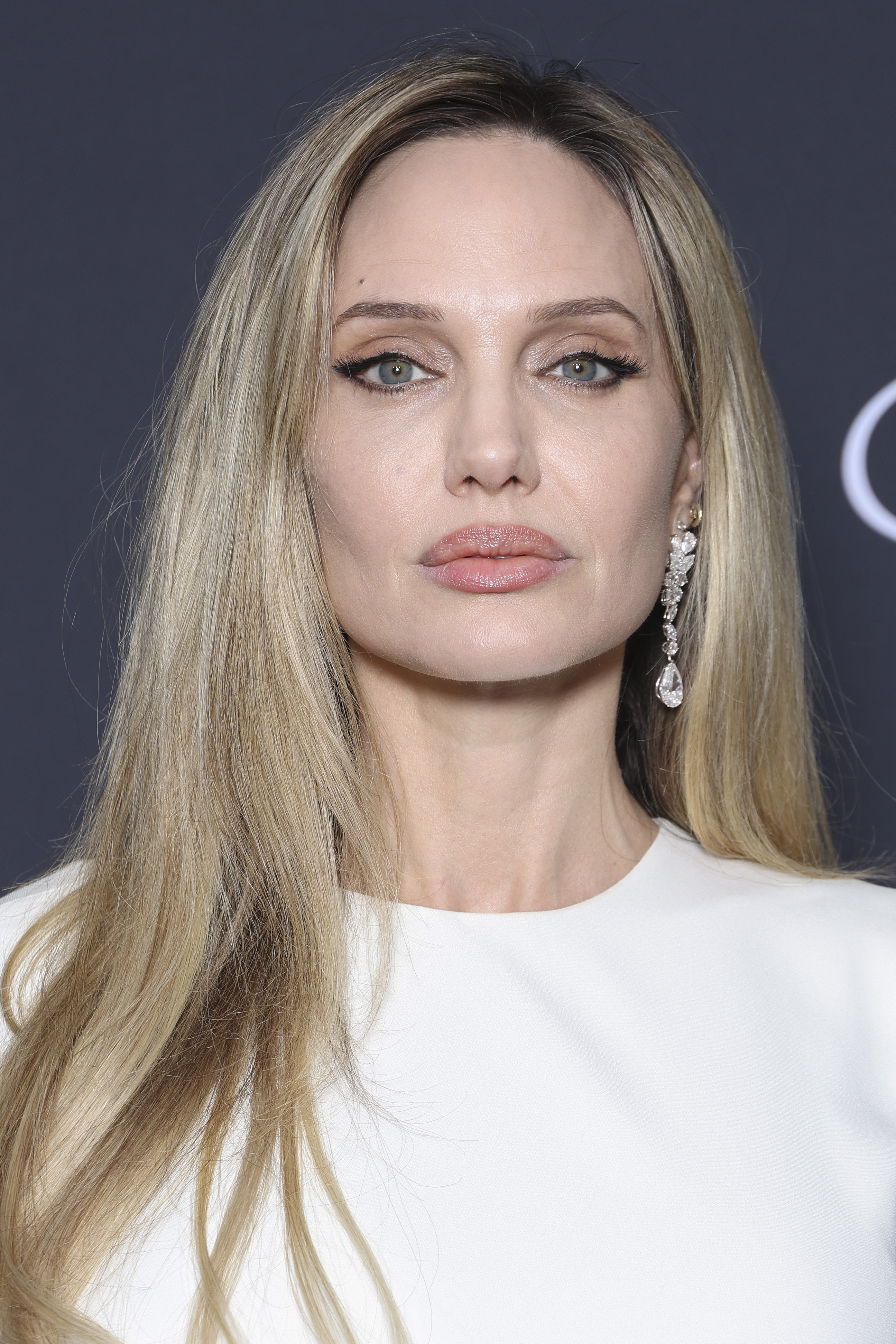 Angelina Jolie attends the photocall for the Chopard Trophy at the 78th annual Cannes Film Festival at Carlton Beach on May 16, 2025, in Cannes, France. | Source: Getty Images