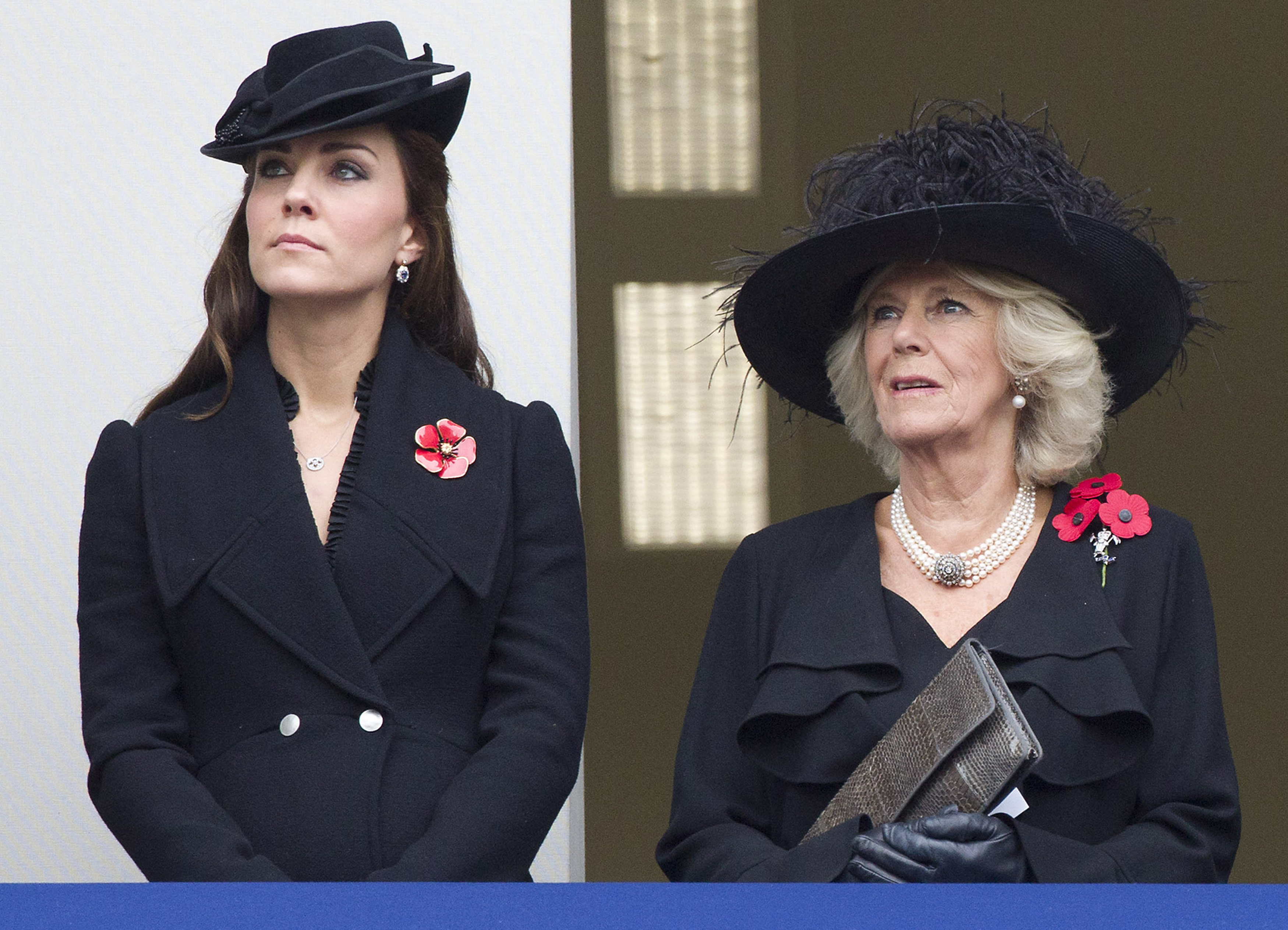 Princess Catherine, Princess of Wales, watches proceedings next to Queen Camilla from a balcony during the Remembrance Sunday ceremony at the Cenotaph on Whitehall on November 9, 2014, in London, England. | Source: Getty Images