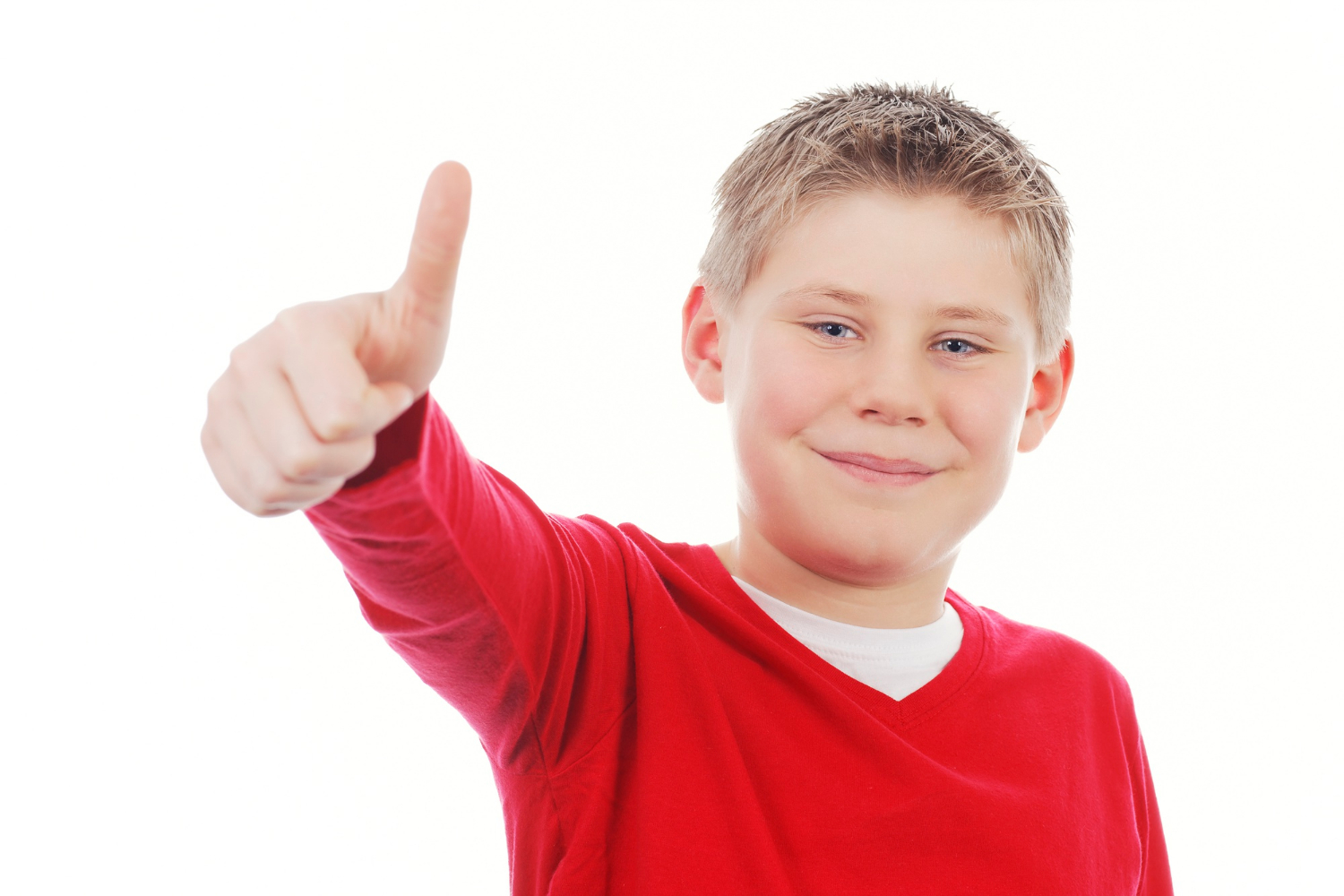 A boy giving a thumbs up | Source: Freepik