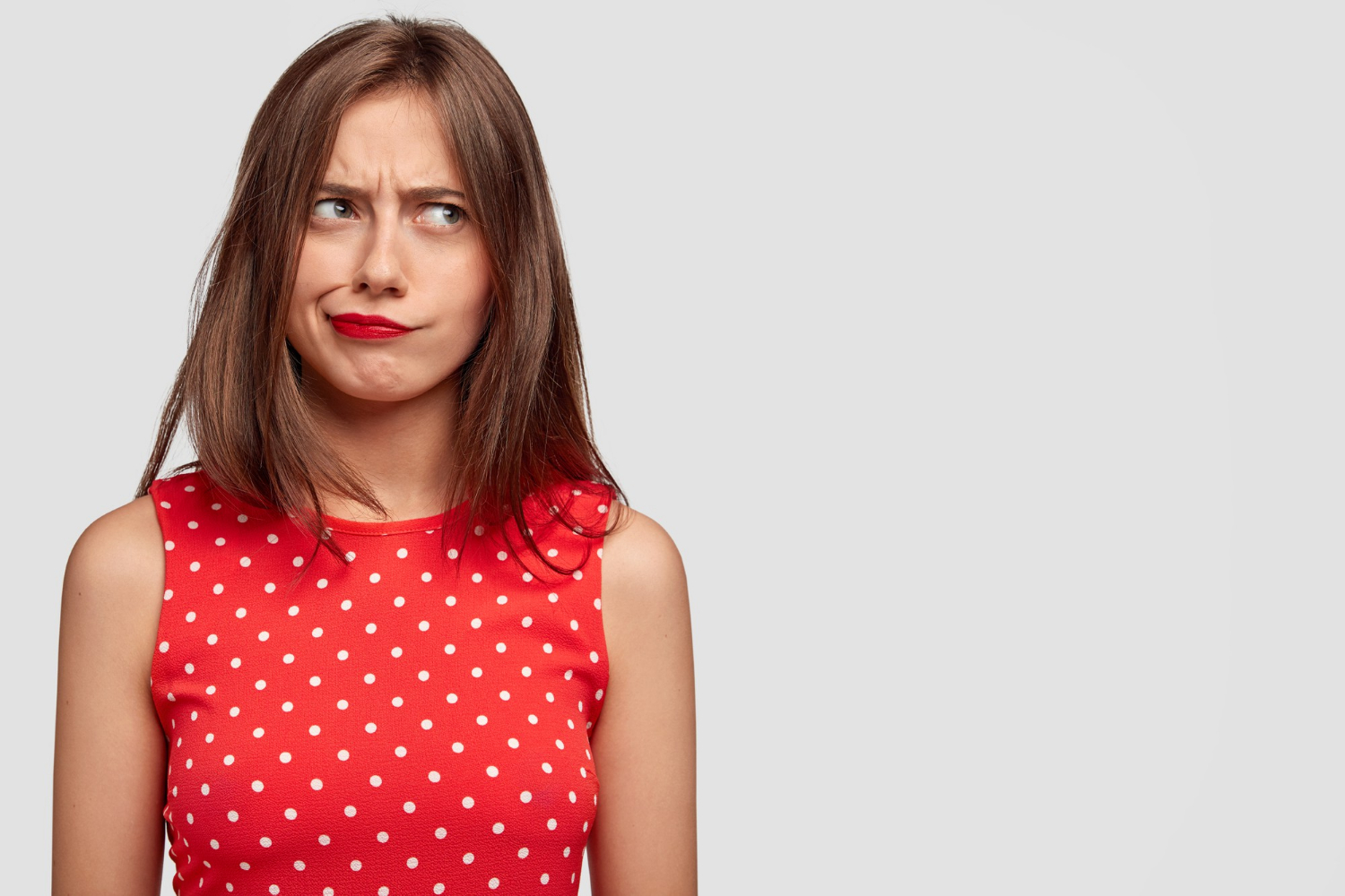 An annoyed woman being expressive | Source: Freepik