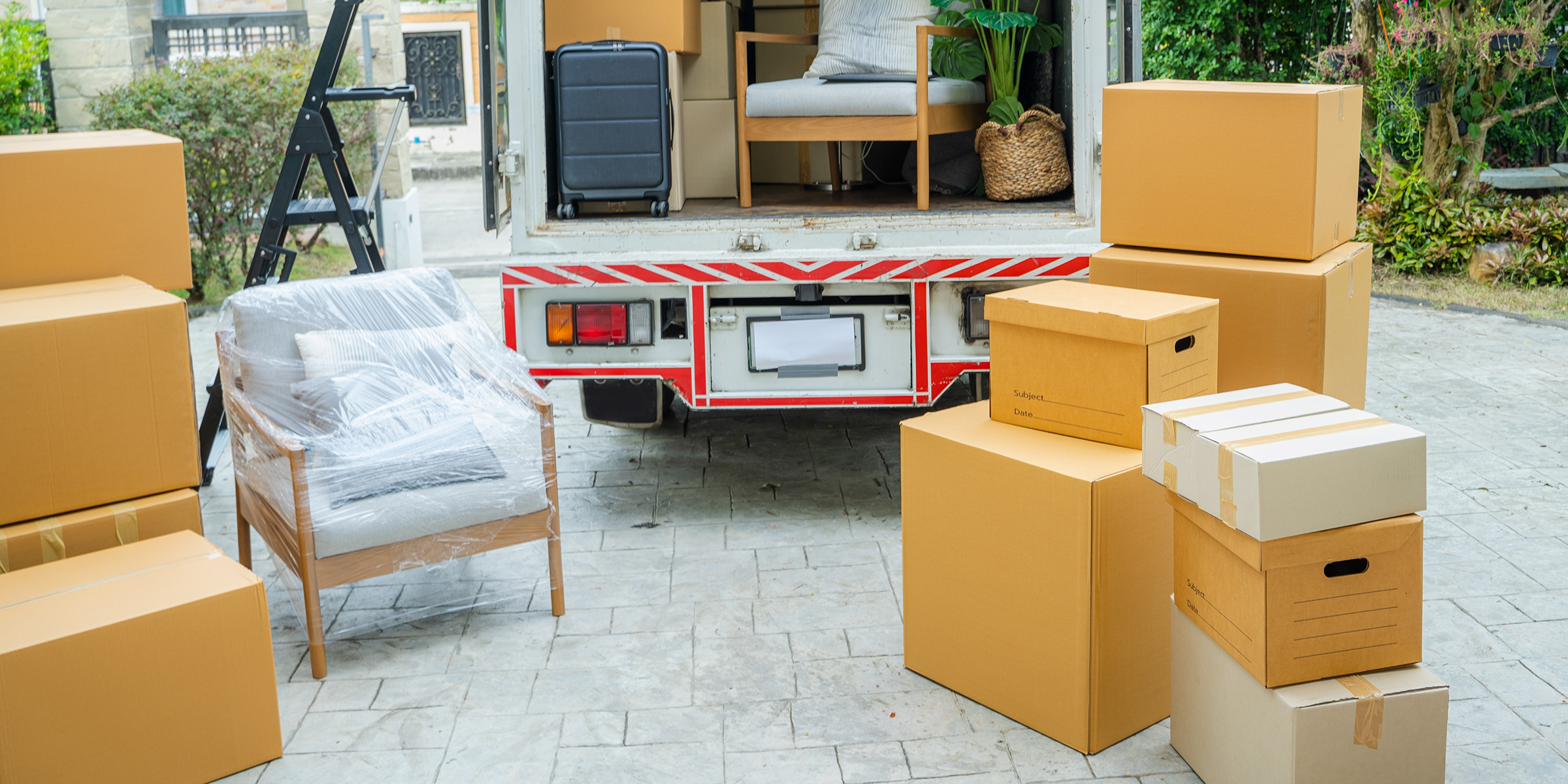 Boxes near a truck | Source: Shutterstock