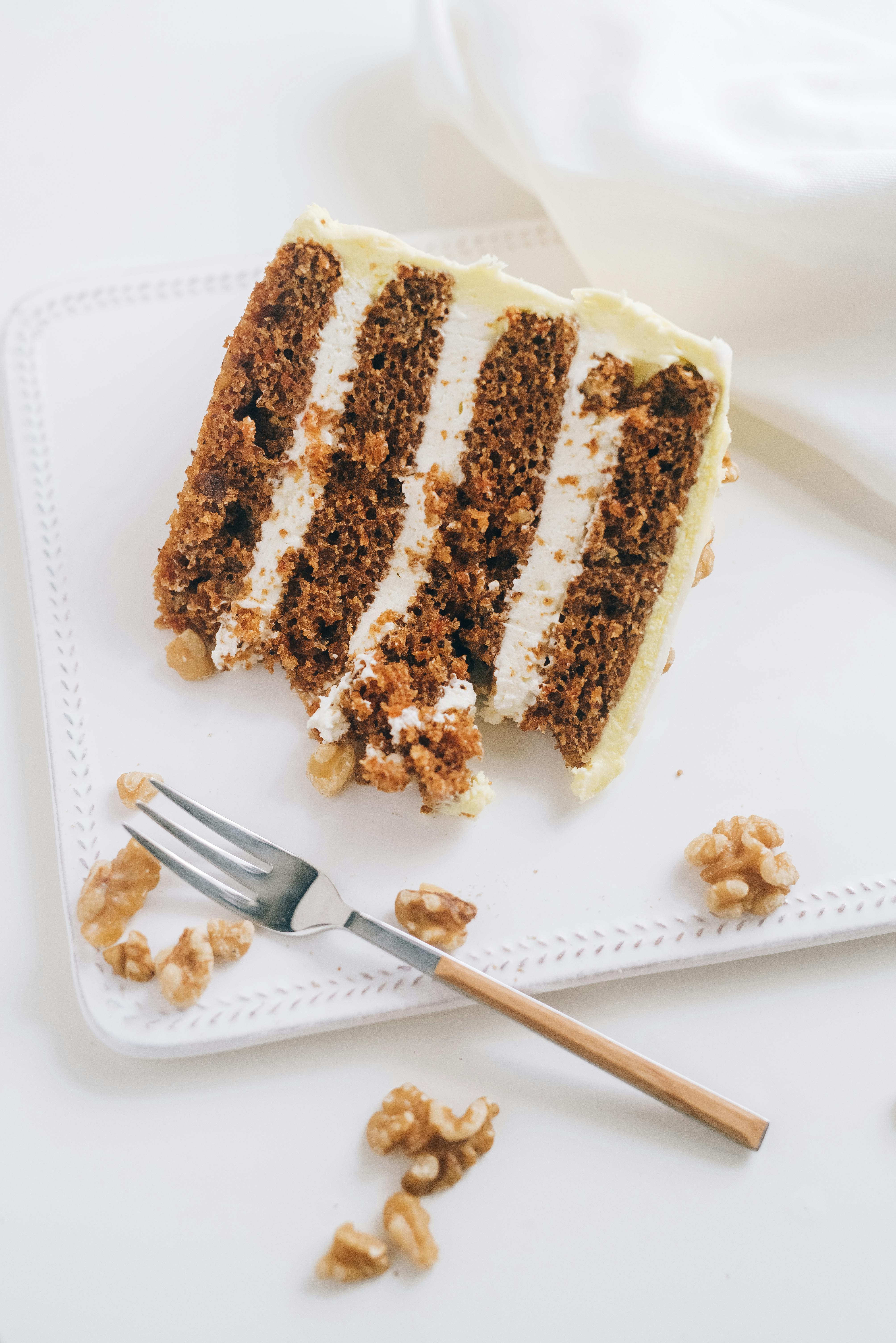 A slice of carrot cake on a table | Source: Pexels