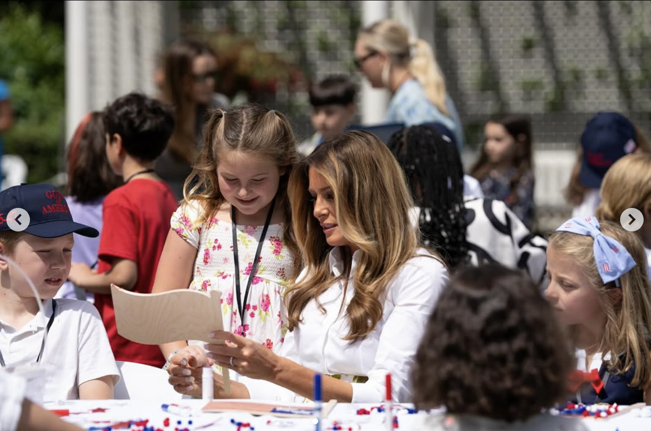 First Lady Melania Trump speaks to one of the children at the "Take Our Daughters and Sons To Work Day" event at the White House on May 20, 2025 | Source: Instagram/flotus
