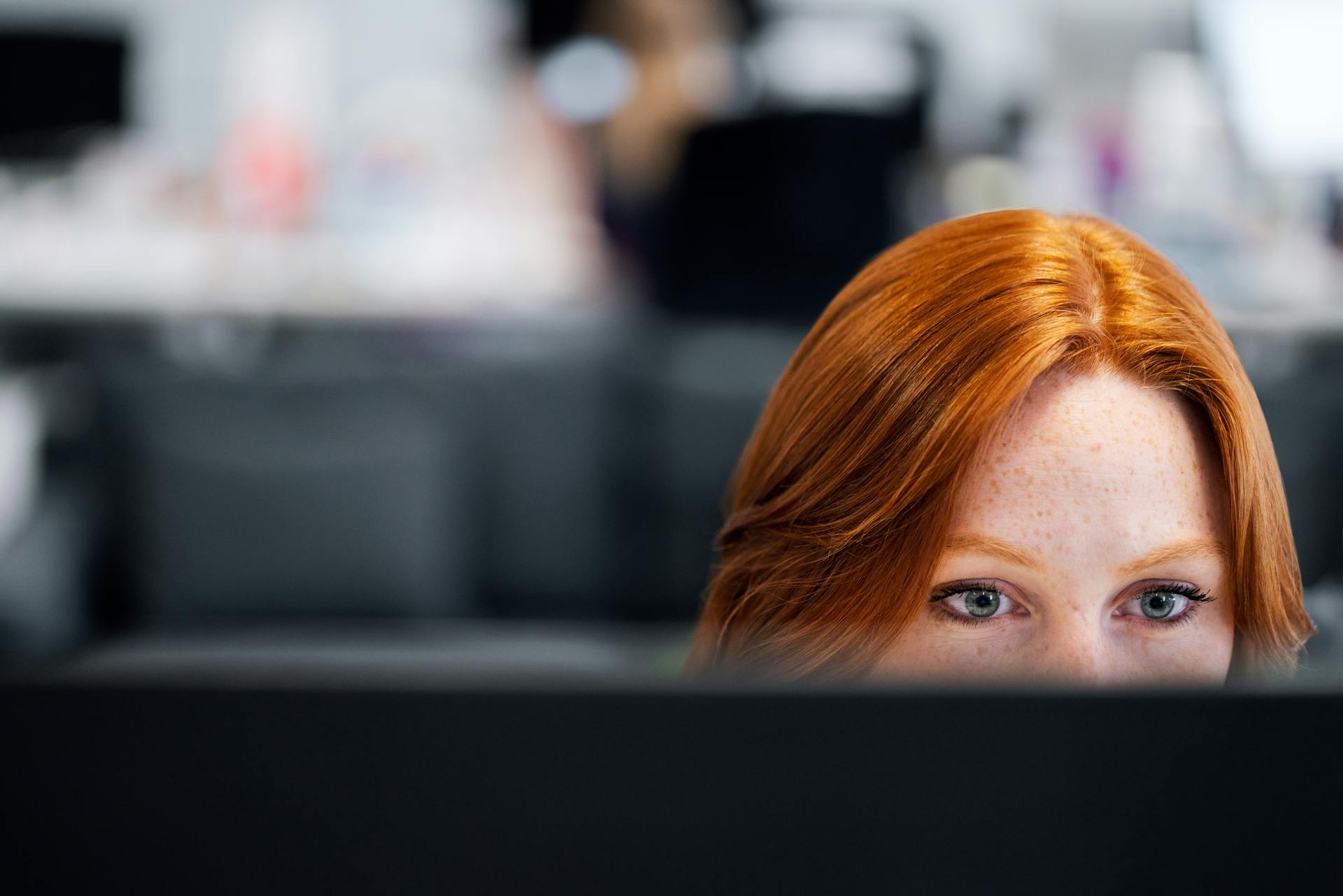 A busy woman in her office | Source: Pexels