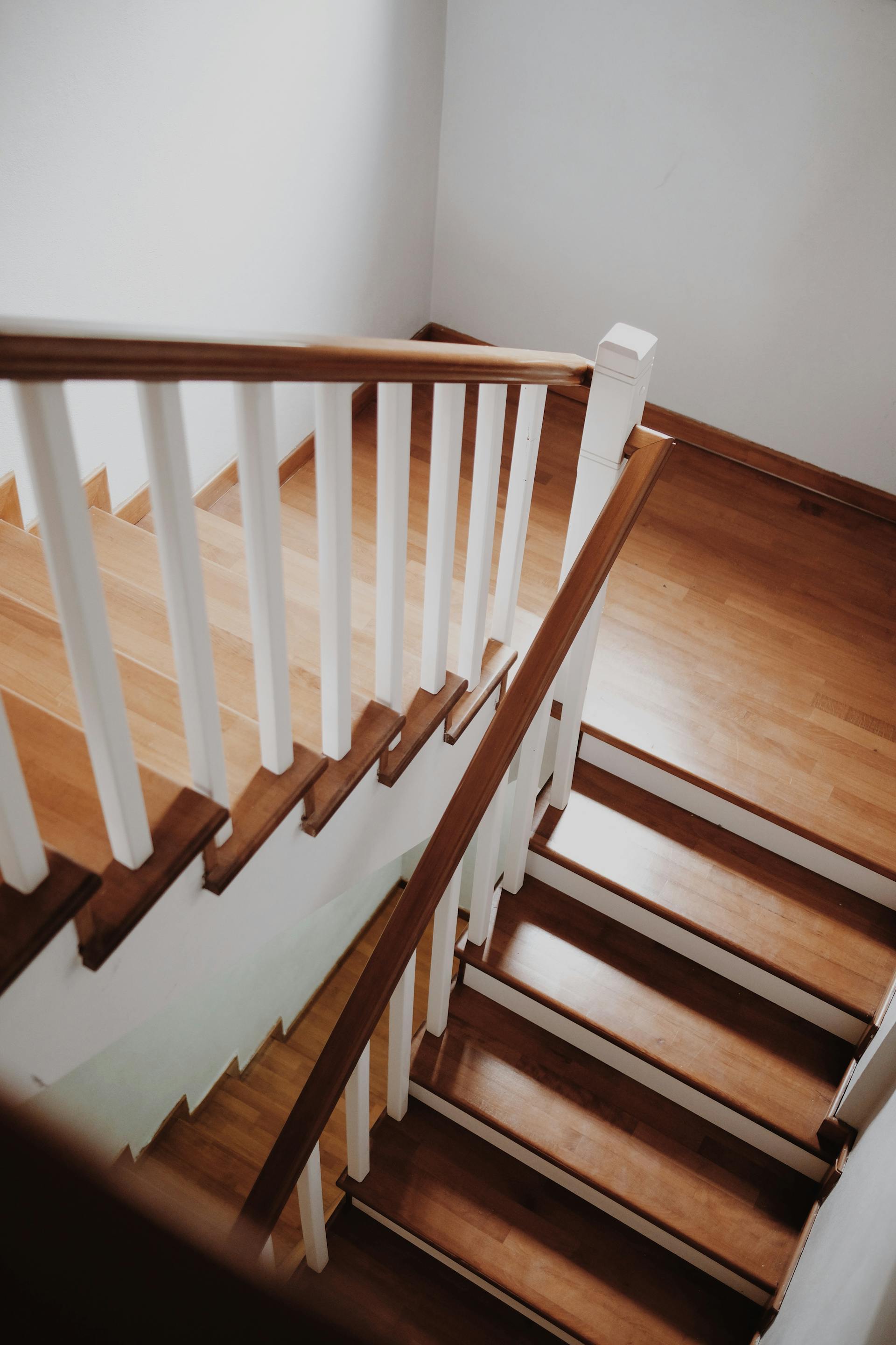 A wooden staircase in a house | Source: Pexels