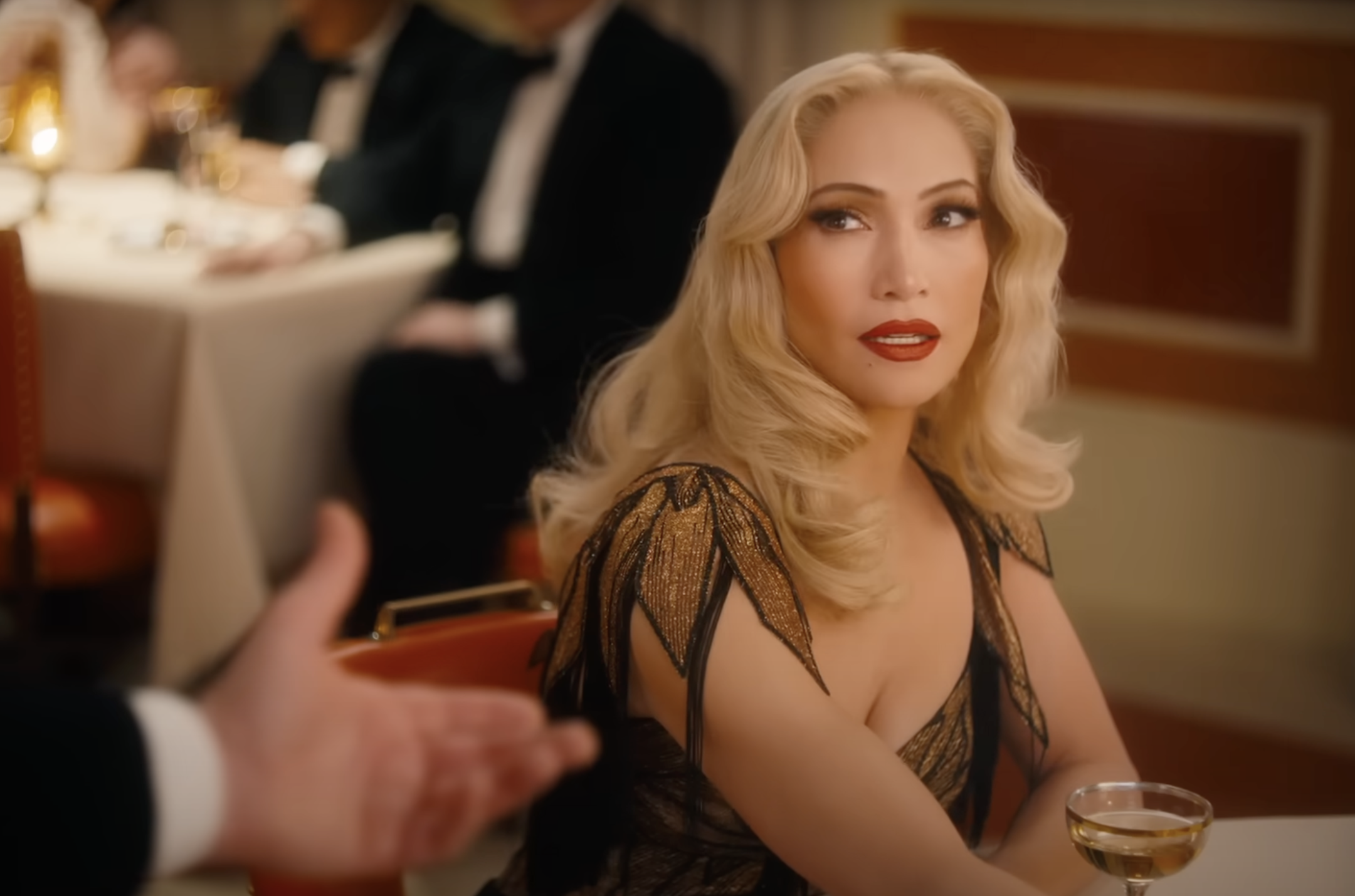 Jennifer Lopez debuts a blonde look on the trailer of "Kiss of a Spider Woman" posted on June 5, 2025 | Source: YouTube/Jennifer Lopez