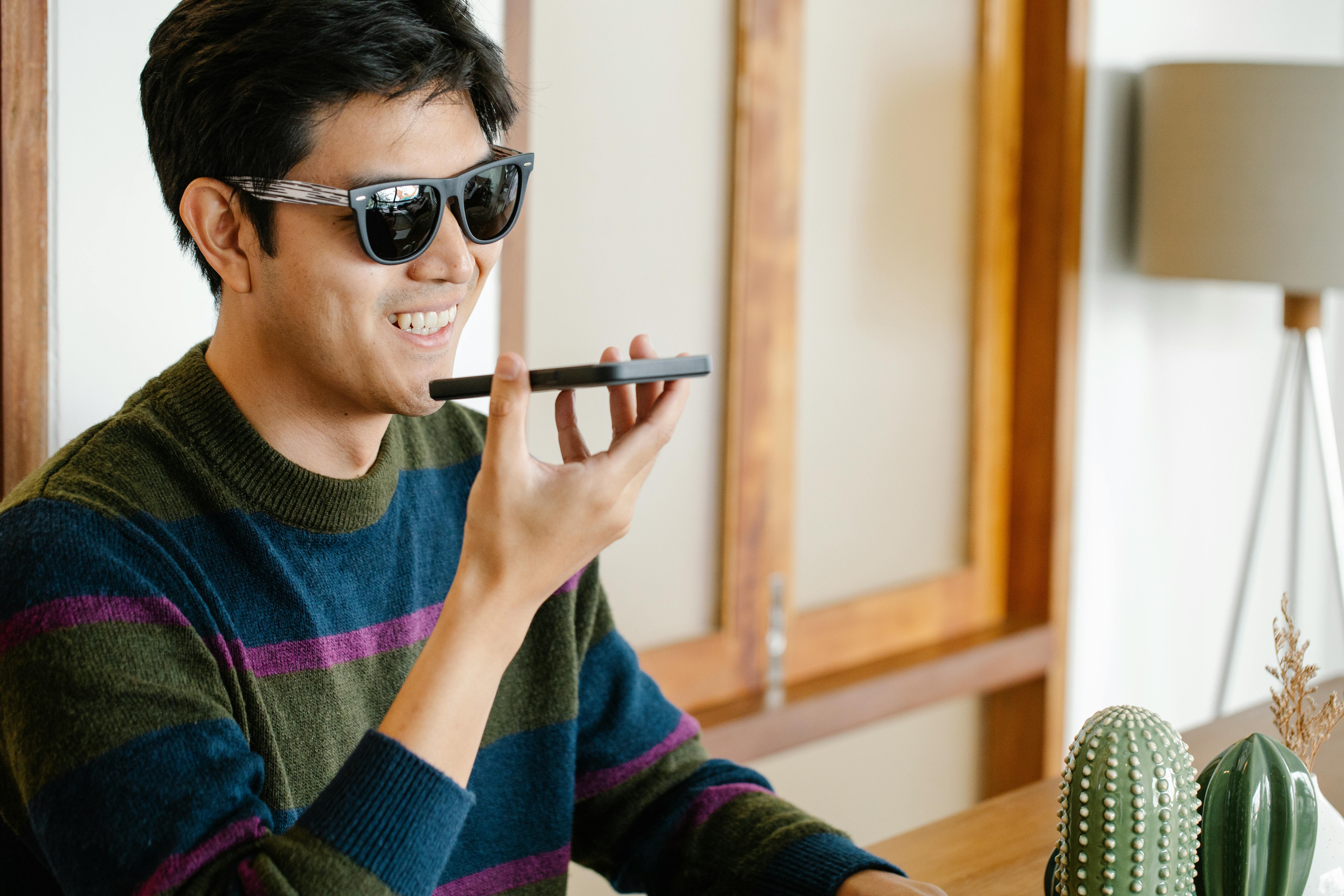 A happy man on a call | Source: Pexels