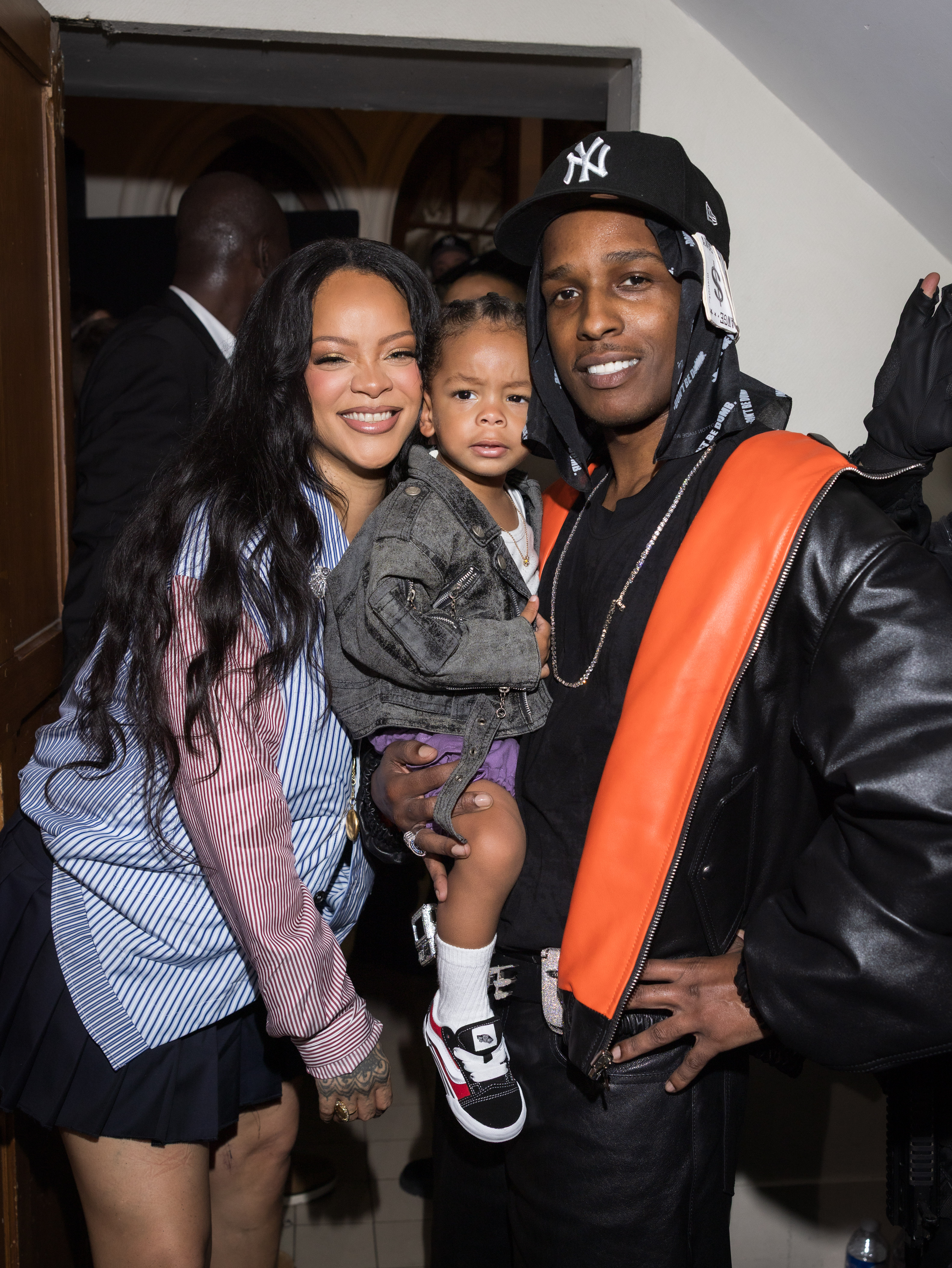 Rihanna, Riot, and A$AP Rocky attend the AWGE Menswear Spring/Summer 2026 show as part of Paris Fashion Week on June 27, 2025, in Paris, France. | Source: Getty Images