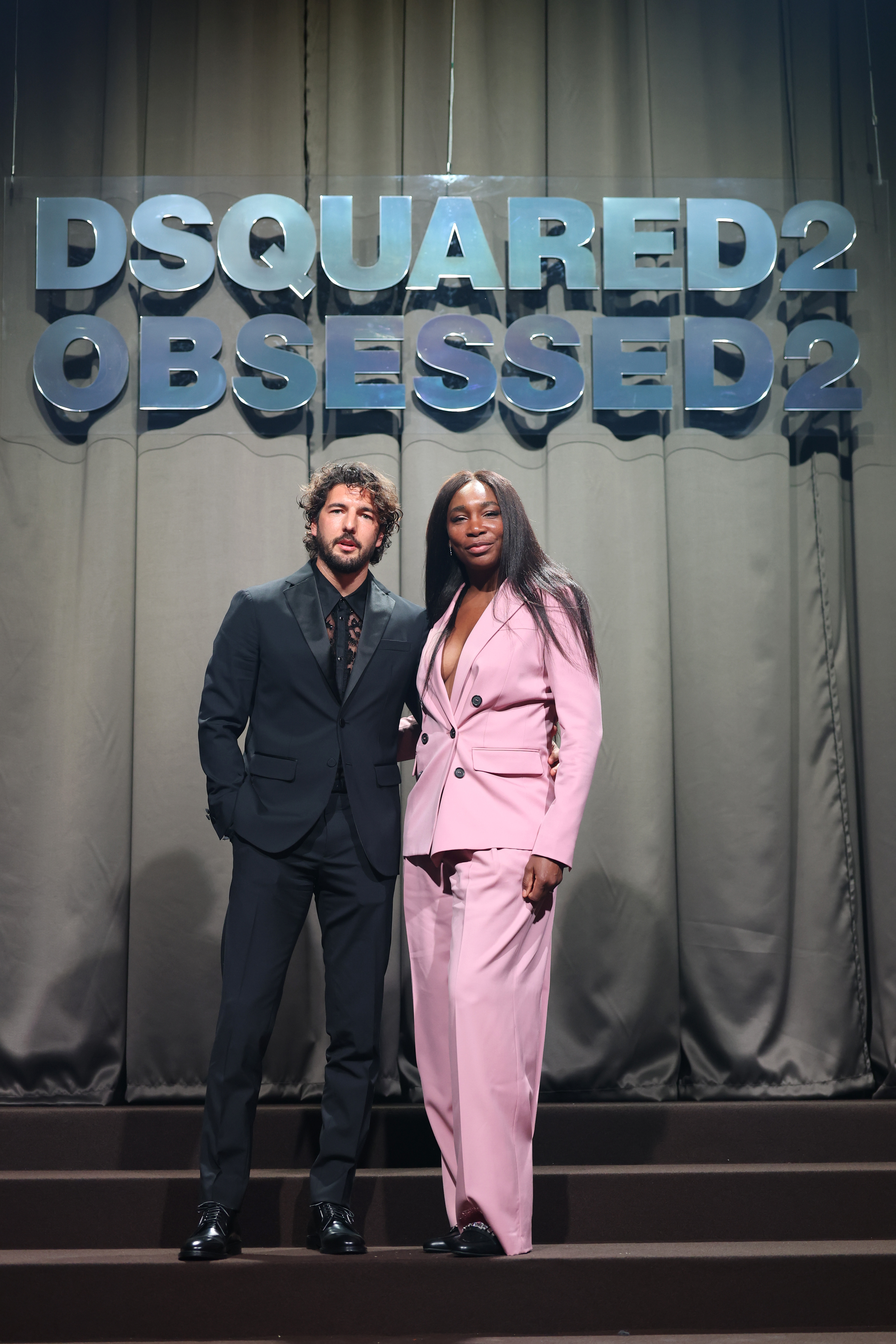 Andrea Preti and Venus Williams attend the photocall ahead of the Dsquared2 F/W 2025 - 2026 runway during the Milan Fashion Week - Womenswear Fall/Winter 2025/2026 at on February 25, 2025, in Milan, Italy. | Source: Getty Images