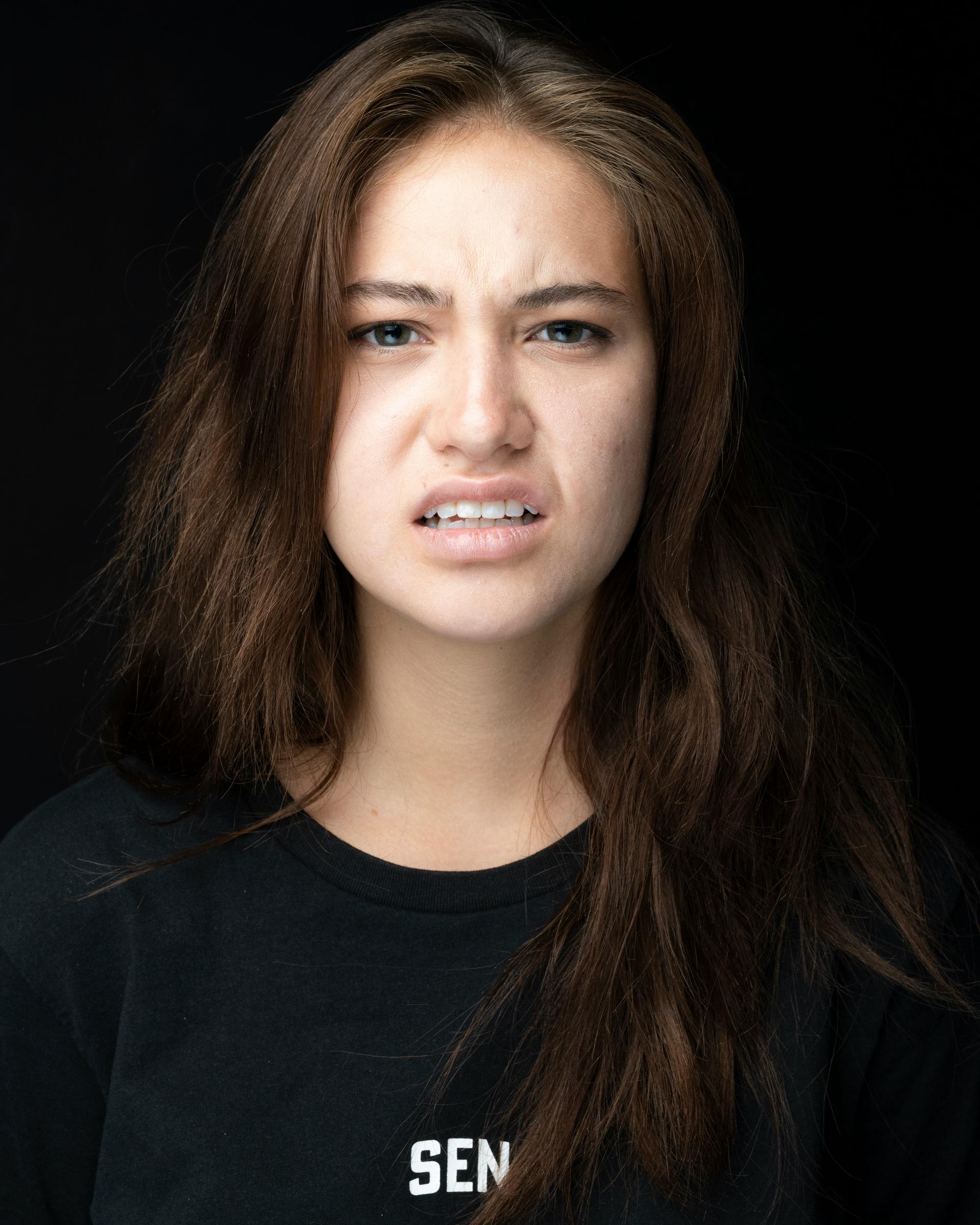 A frowning young woman | Source: Unsplash