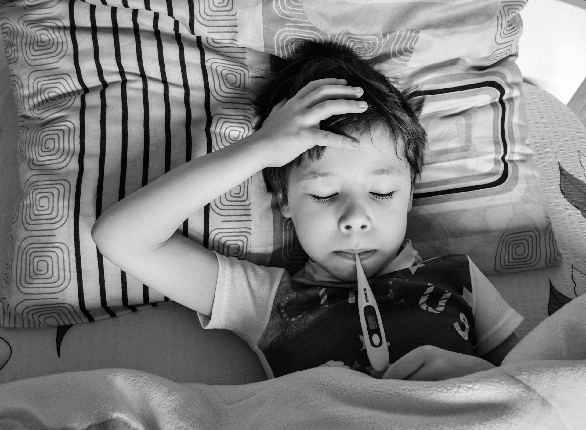 A little boy down with a fever | Source: Pexels