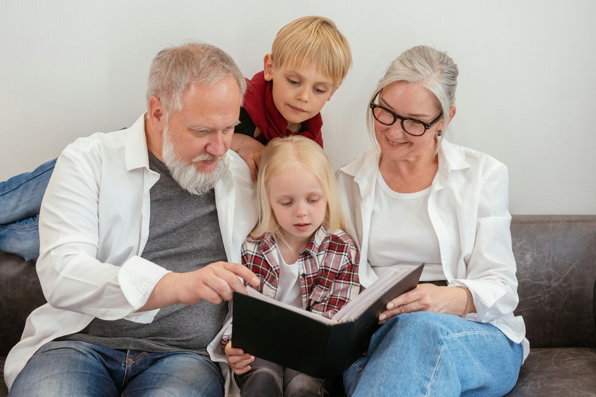 An older couple bonding with children | Source: Pexels