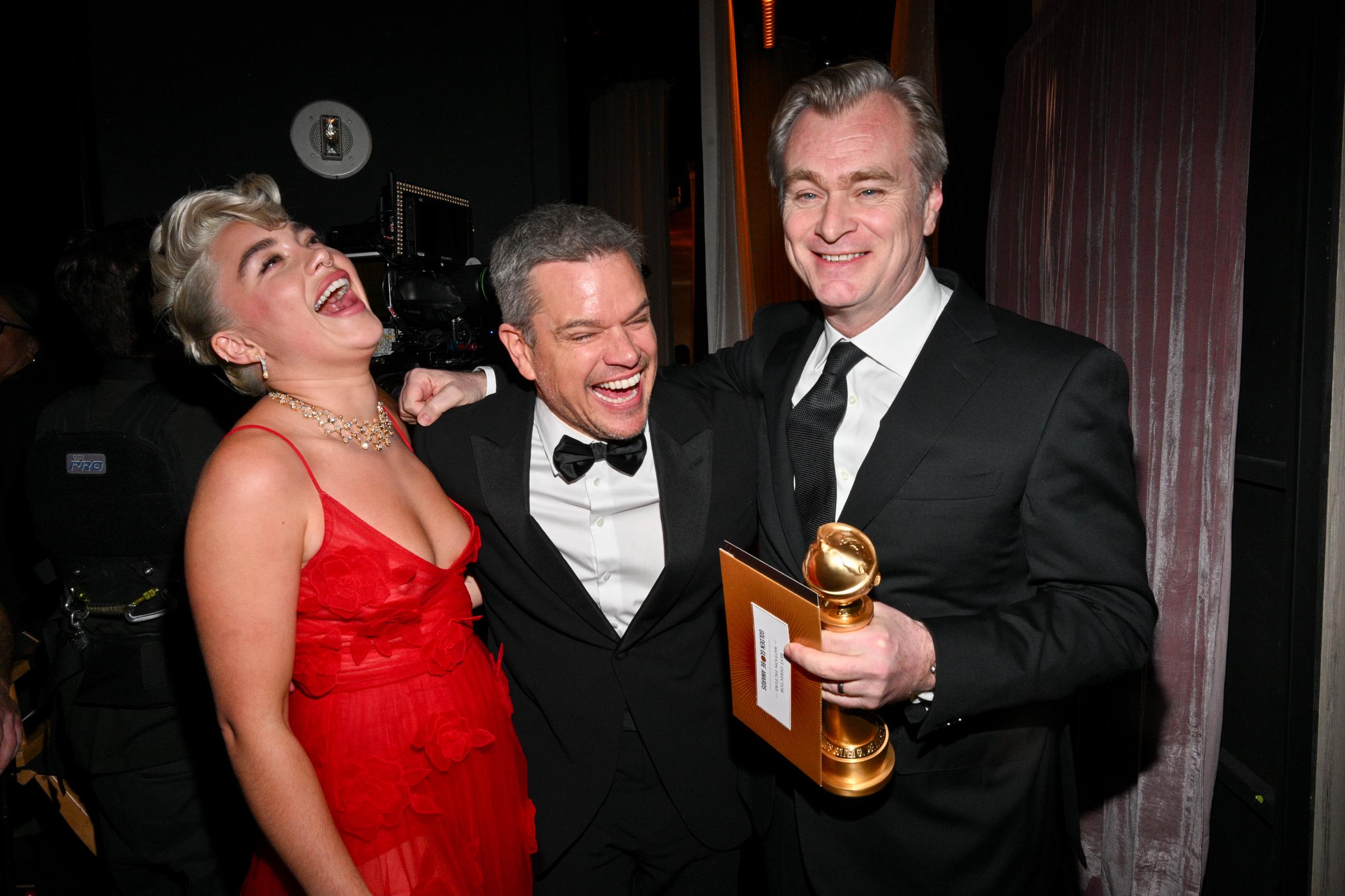 Florence Pugh, Matt Damon and Christopher Nolan at the 81st Golden Globe Awards held at the Beverly Hilton Hotel on January 7, 2024 in Beverly Hills, California. | Source: Getty Images