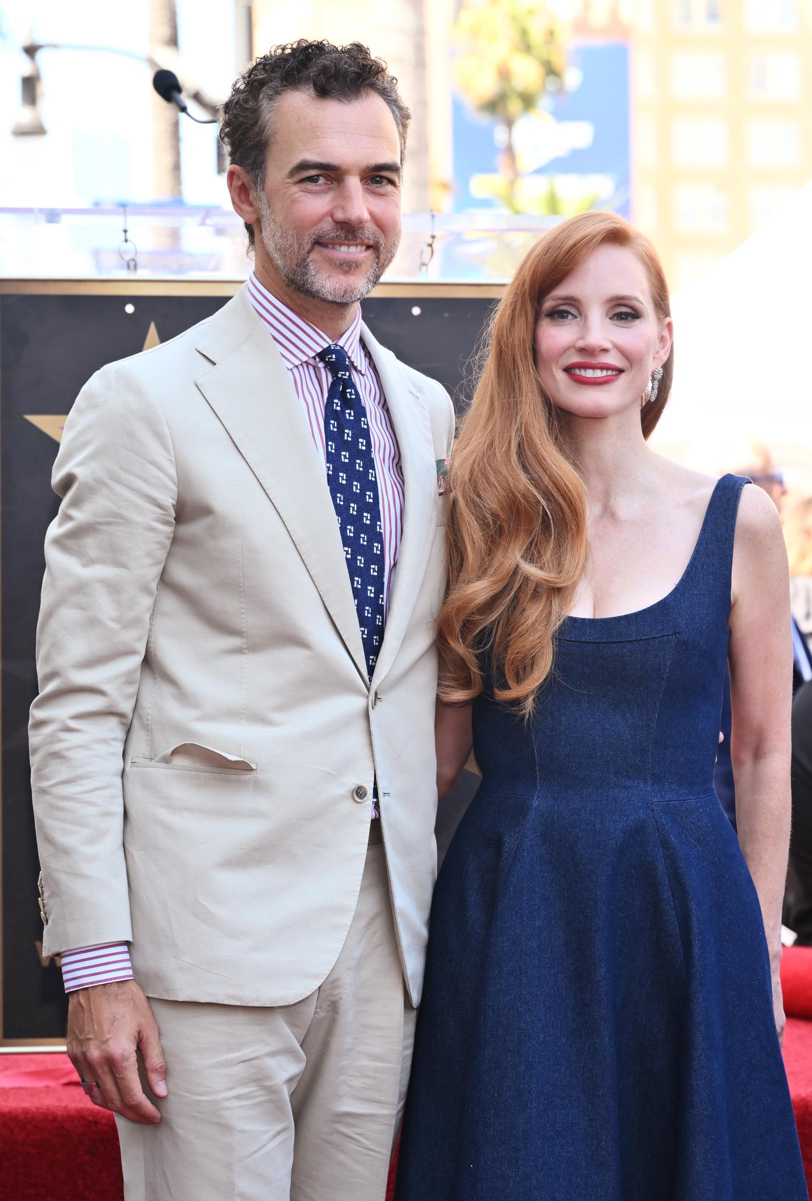 Gian Luca Passi de Preposulo and Jessica Chastain pose at the ceremony honoring Jessica Chastain with a star on the Hollywood Walk Of Fame on September 4, 2025, in Hollywood, California. | Source: Getty Images