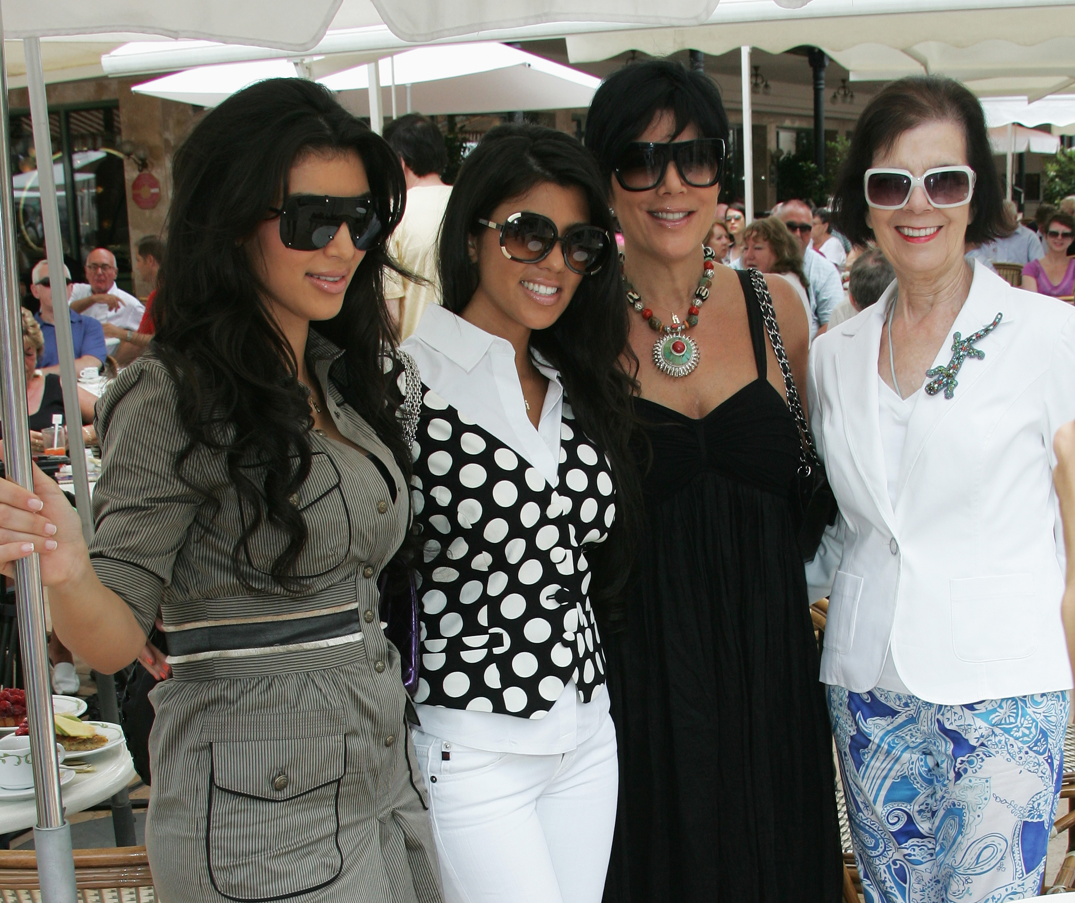 Kim Kardashian and her sister Kourtney with their mother, Kris, and grandmother, Mary Jo Campbell, during a shopping trip on June 12, 2008 in Monte Carlo, Principality of Monaco. | Source: Getty Images