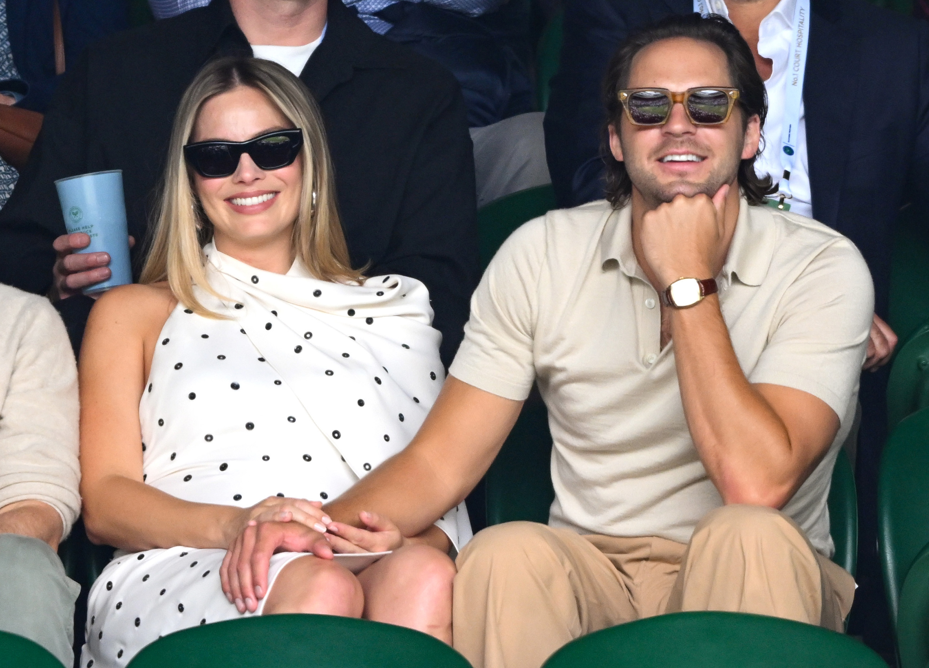Tom Ackerley and Margot Robbie attend day twelve of the Wimbledon Tennis Championships at the All England Lawn Tennis and Croquet Club on July 12, 2024, in London, England. | Source: Getty Images
