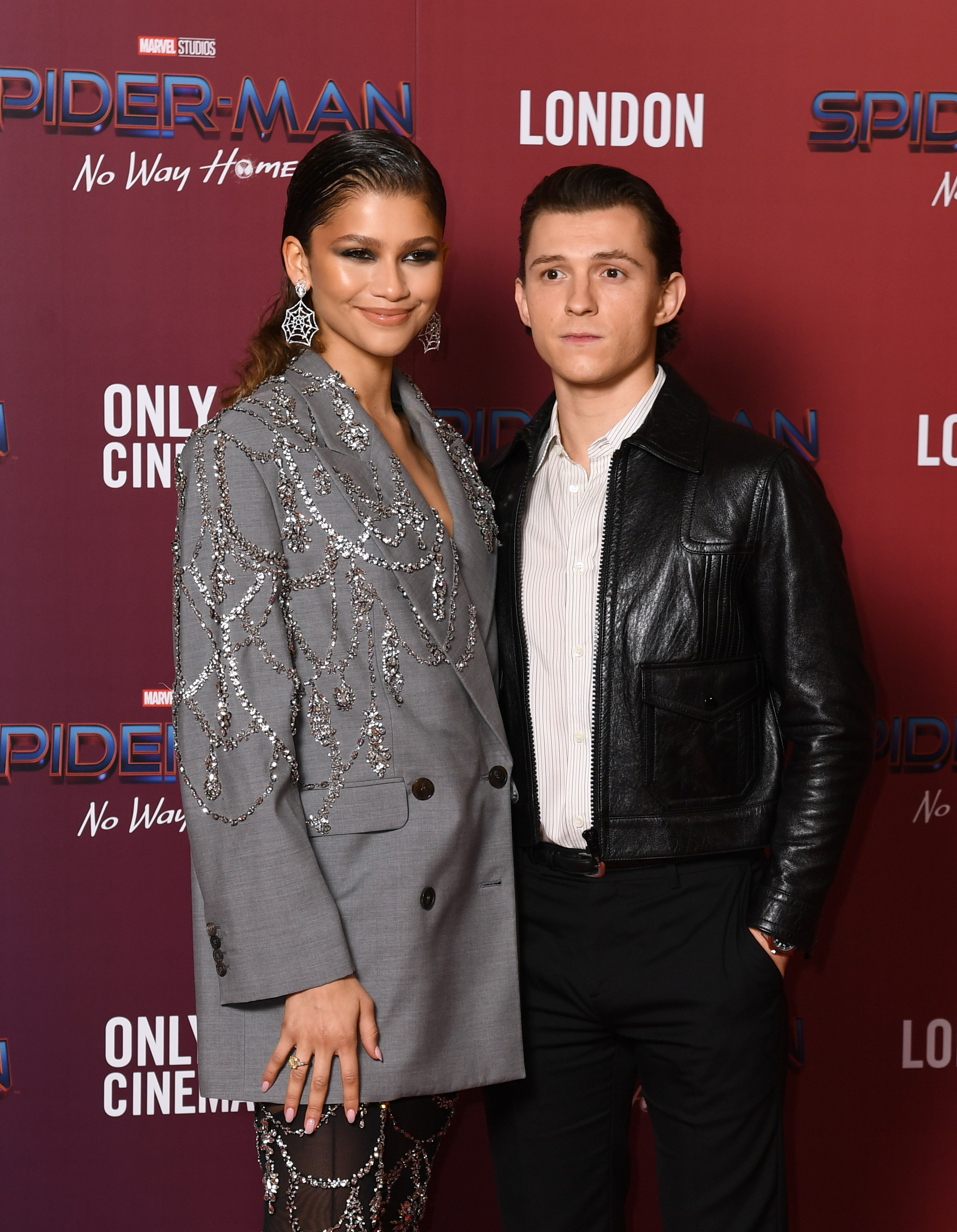 Zendaya and Tom Holland attend a photocall for "Spiderman: No Way Home" at The Old Sessions House on December 05, 2021 in London, England. | Source: Getty Images