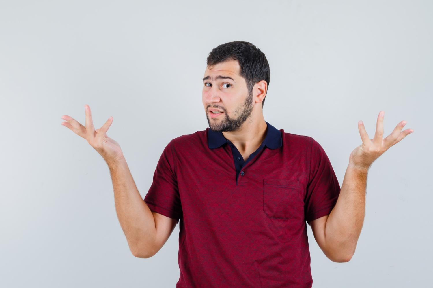 A man shrugging | Source: Freepik