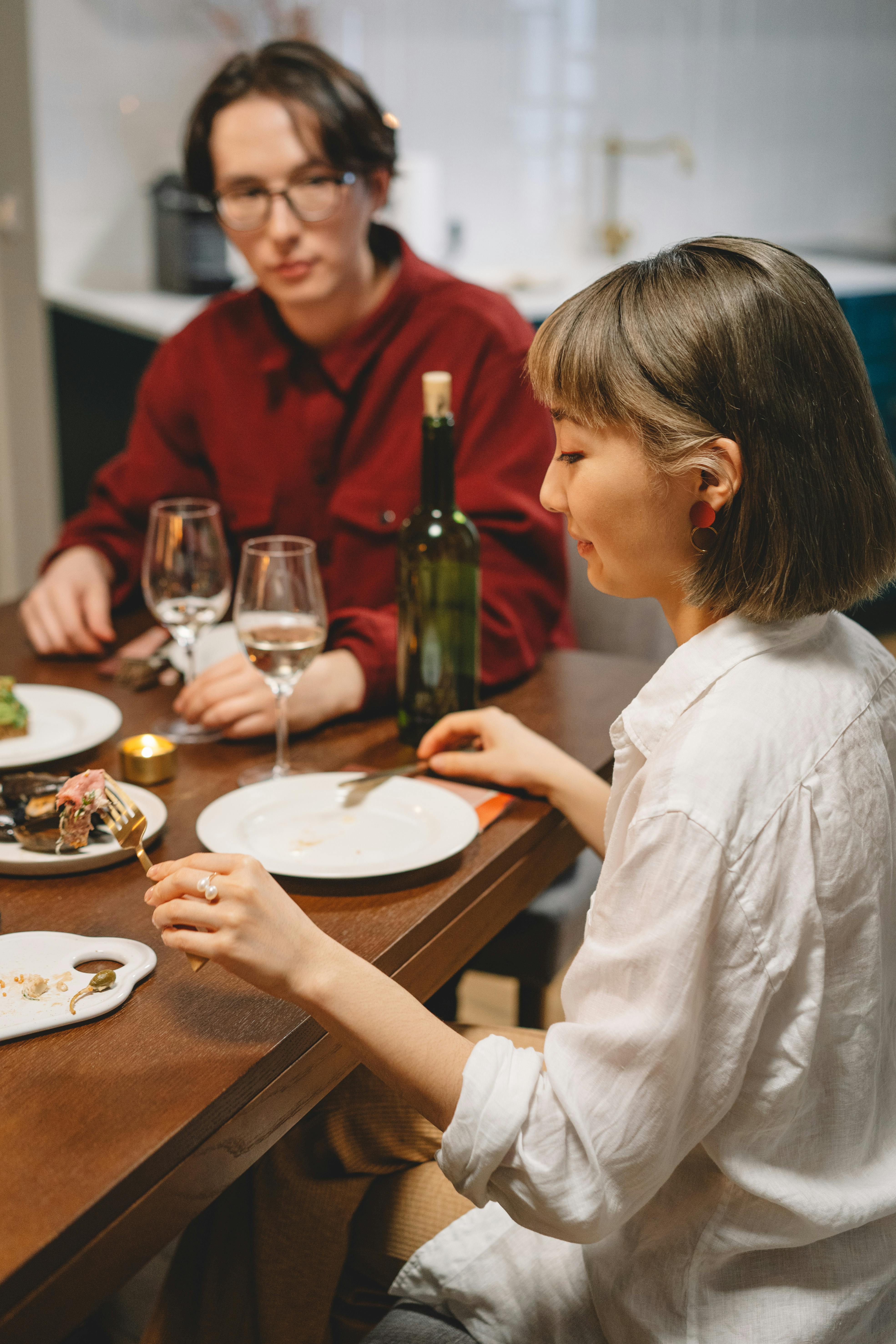 People sitting at a dinner table | Source: Pexels