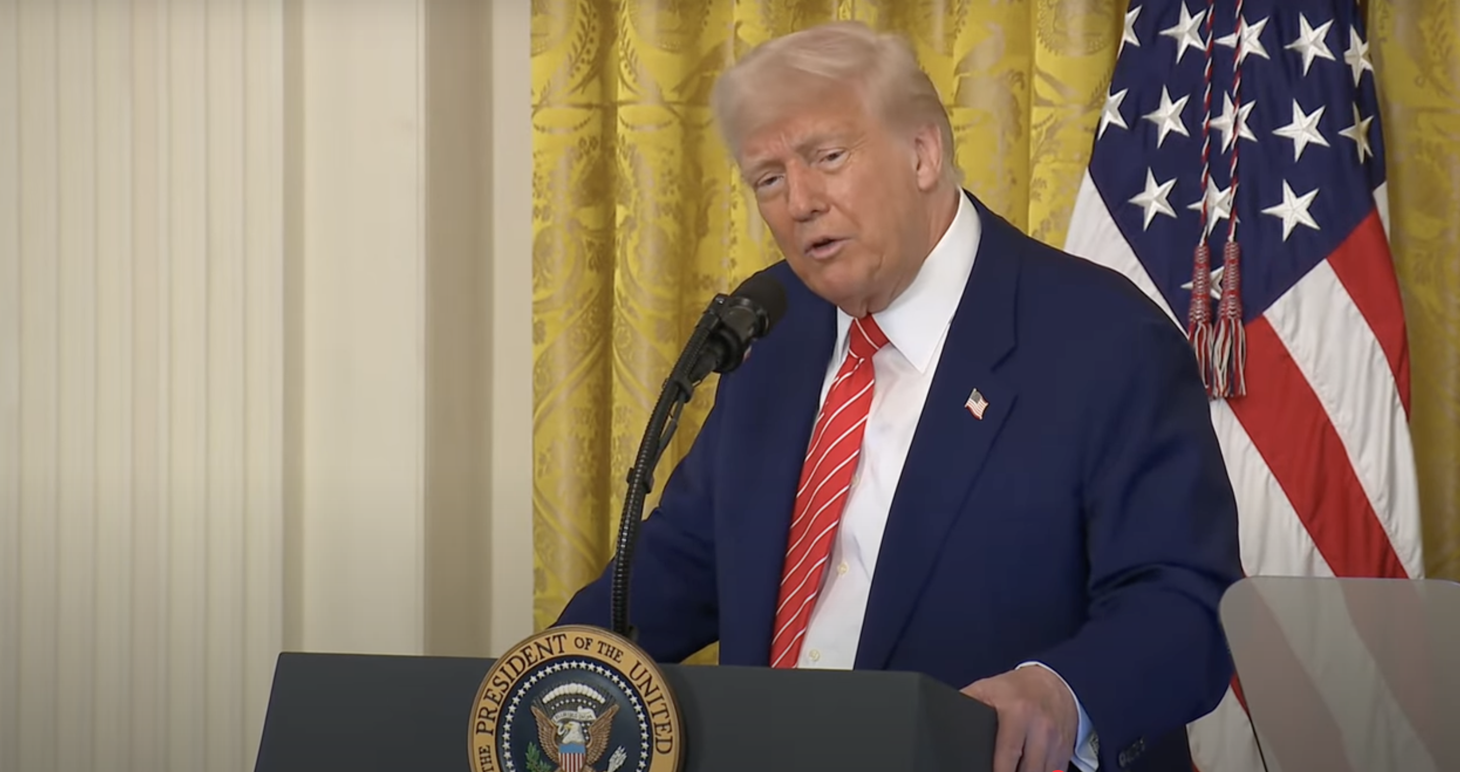President Donald Trump delivers a speech during an event to celebrate military mothers in the East Room of the White House on May 8, 2025 in Washington, D.C. | Source: YouTube/TheWhiteHouse