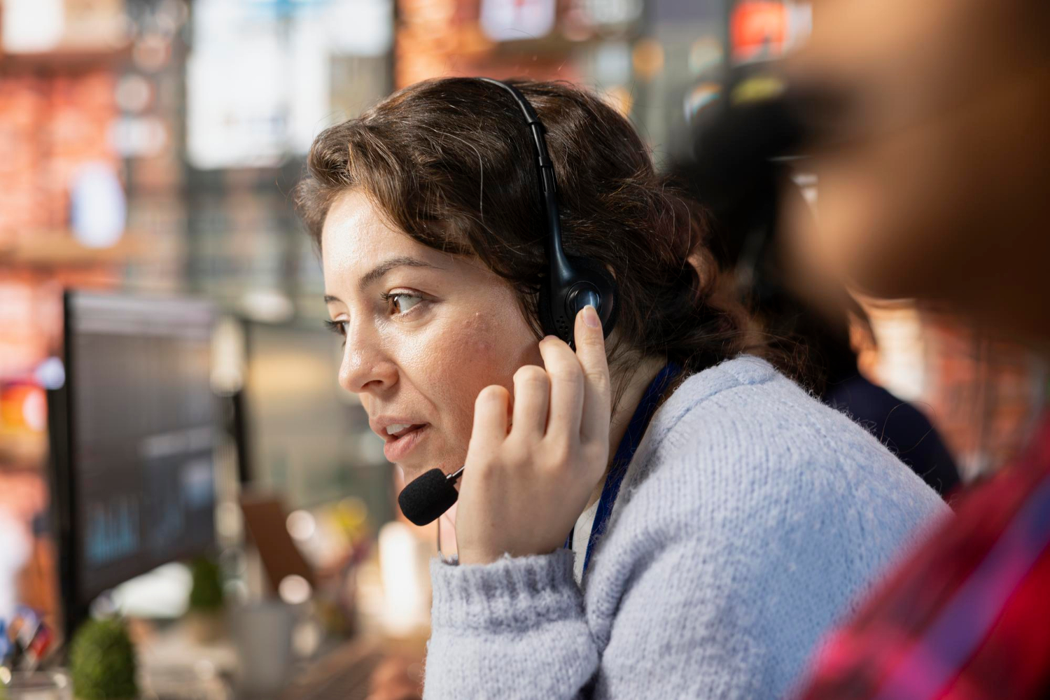 An operator engaged on a call | Source: Freepik