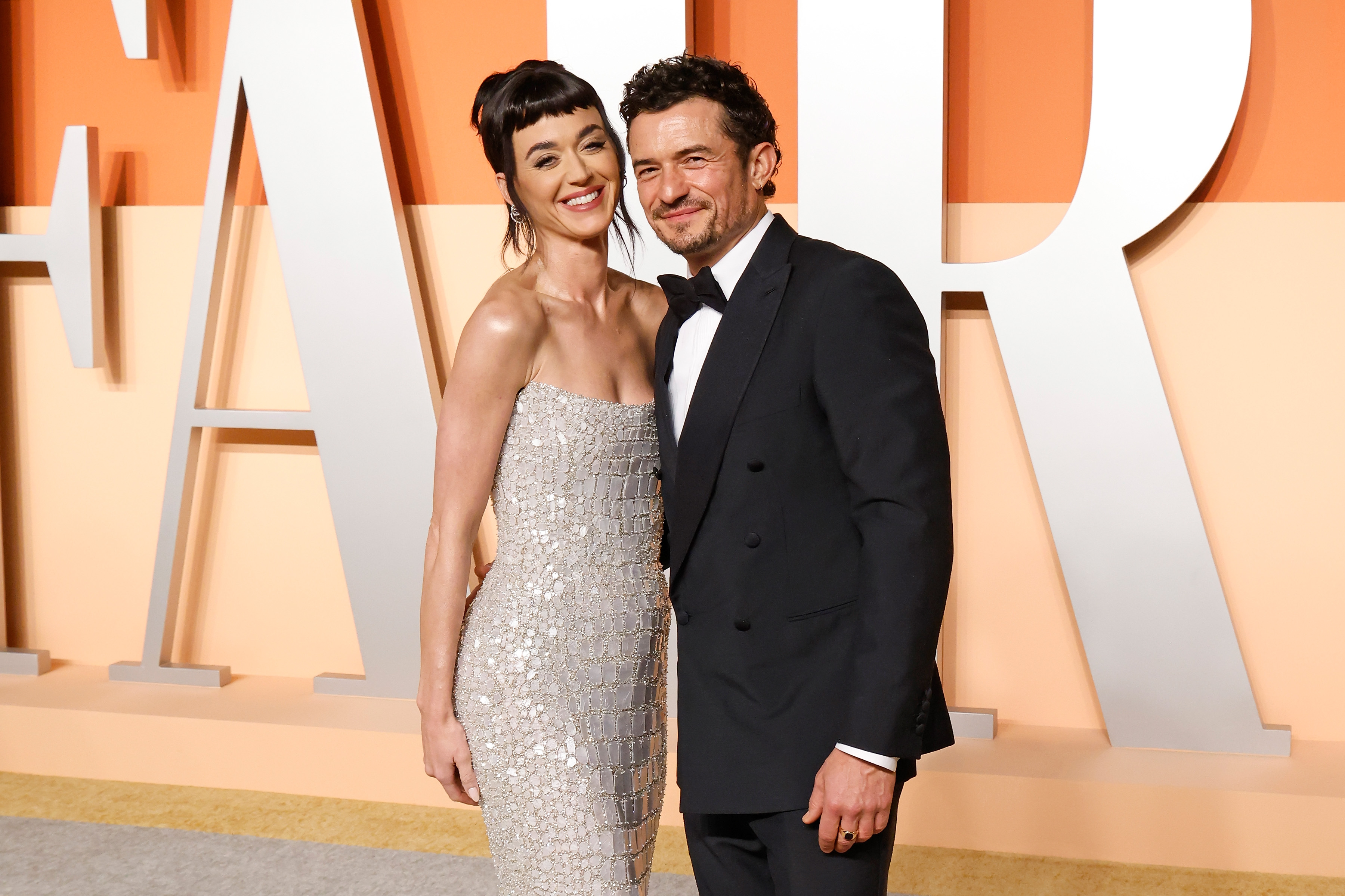 Katy Perry and Orlando Bloom attend the 2025 Vanity Fair Oscar Party hosted by Radhika Jones at Wallis Annenberg Center for the Performing Arts on March 02, 2025 in Beverly Hills, California | Source: Getty Images