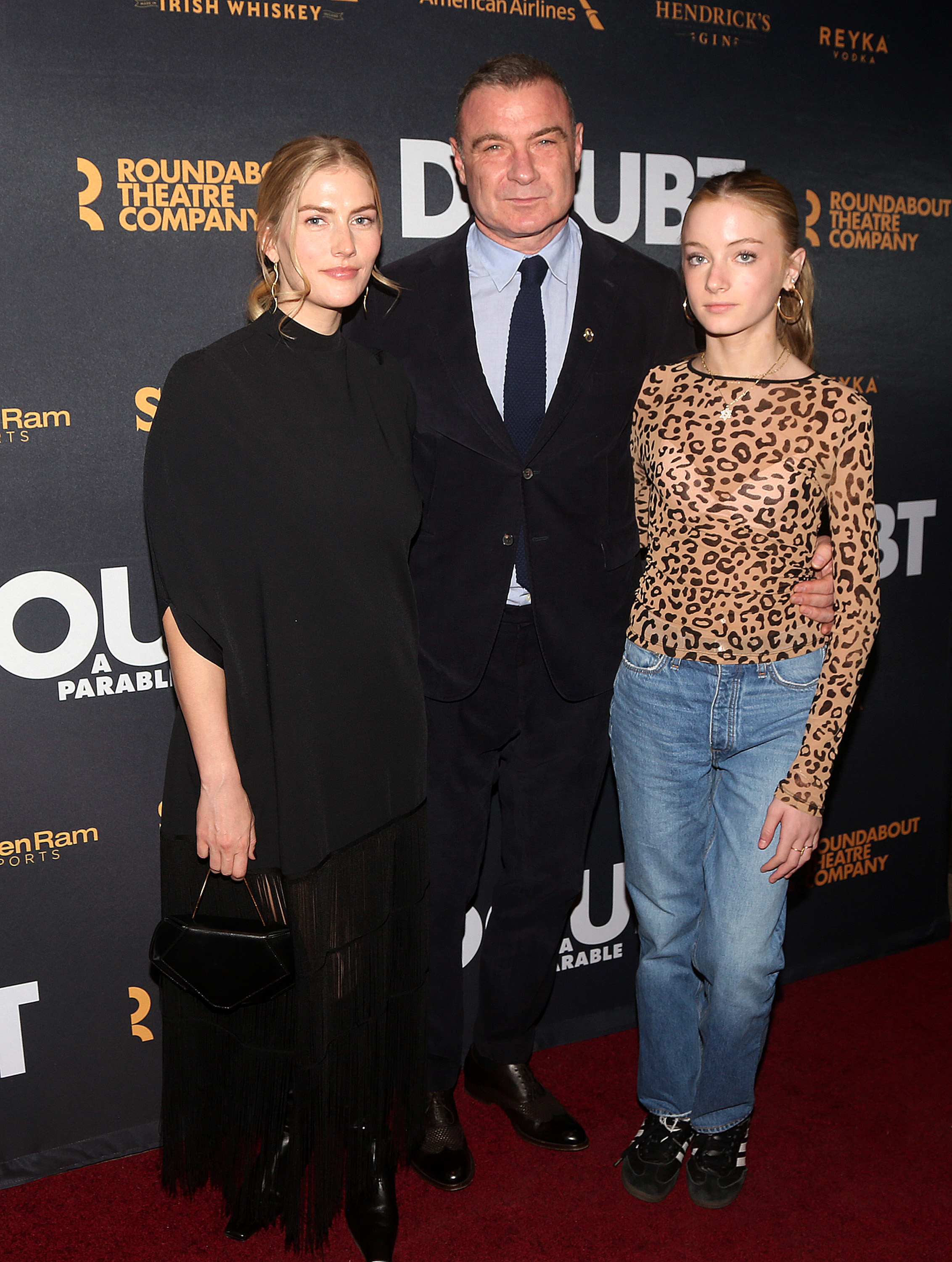 (L-R) Taylor Neisen, Liev Schreiber, and Kai Schreiber pose at the opening night of the revival of John Patrick Shanley's play "Doubt: A Parable" on Broadway at The Todd Haimes Theatre on February 29, 2024, in New York City. | Source: Getty Images