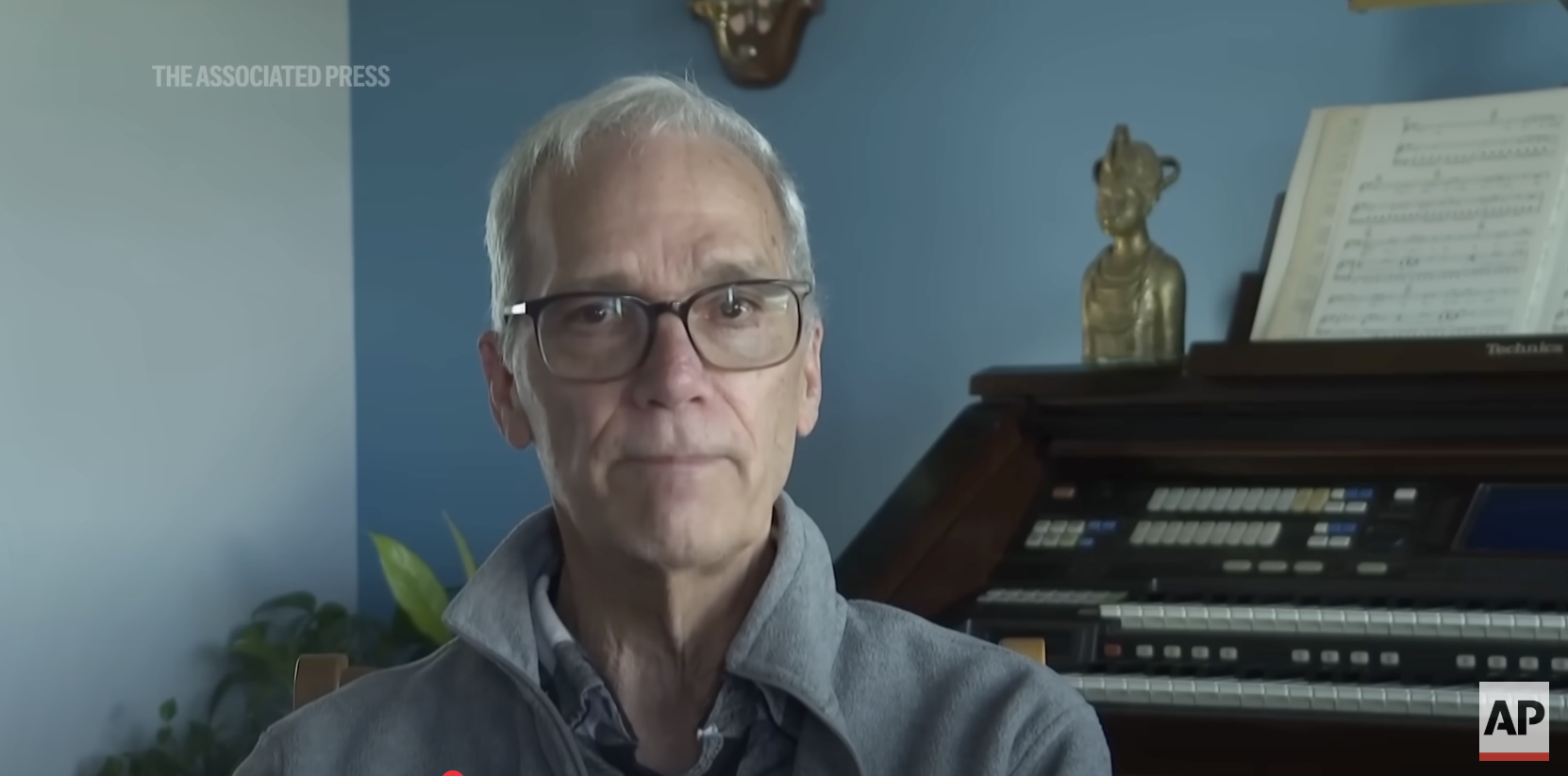 Pope Leo XIV's brother, John Prevost, during his interview with The Associated Press posted May 10, 2025 | Source: YouTube/The Associated Press