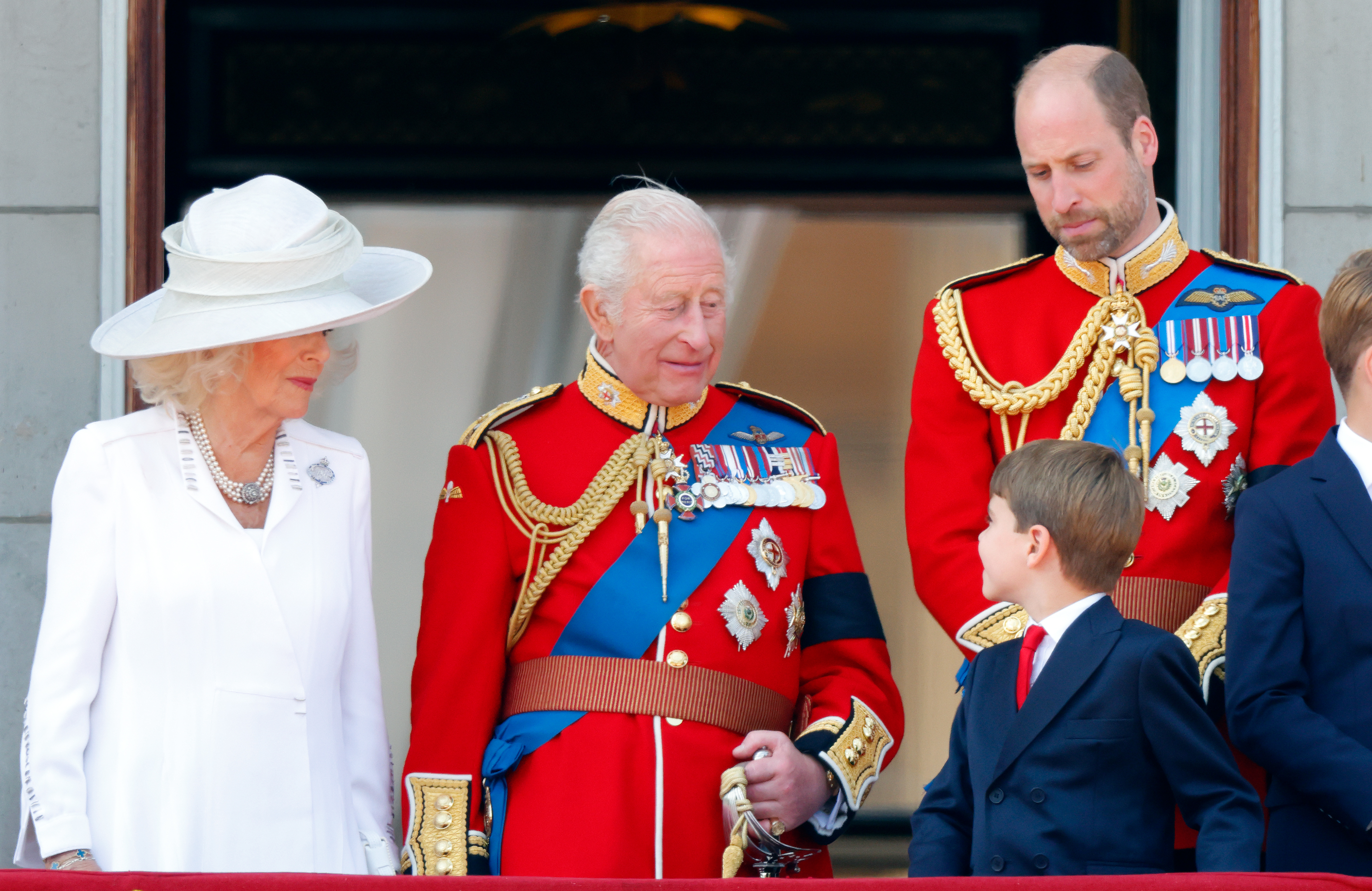 Queen Camilla, King Charles III, Prince Louis of Wales and Prince William, Prince of Wales watch an RAF flypast from the balcony of Buckingham Palace after attending Trooping The Colour 2025 on June 14, 2025 in London, England | Source: Getty Images
