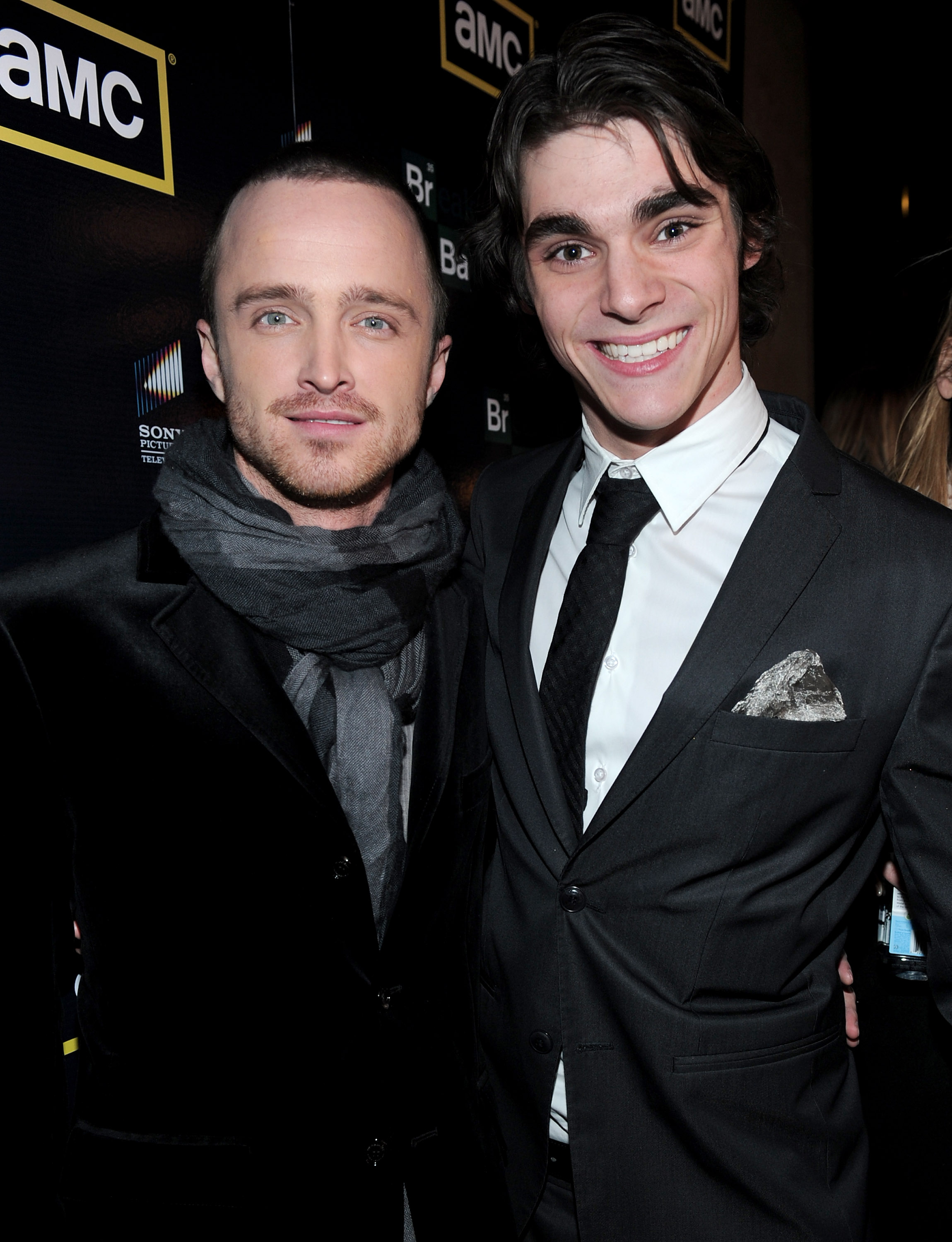 Aaron Paul and RJ Mitte arrive at the premiere of the third season of AMC's Emmy Award winning series "Breaking Bad" at the ArcLight Cinemas on March 9, 2010 in Hollywood, California. | Source: Getty Images
