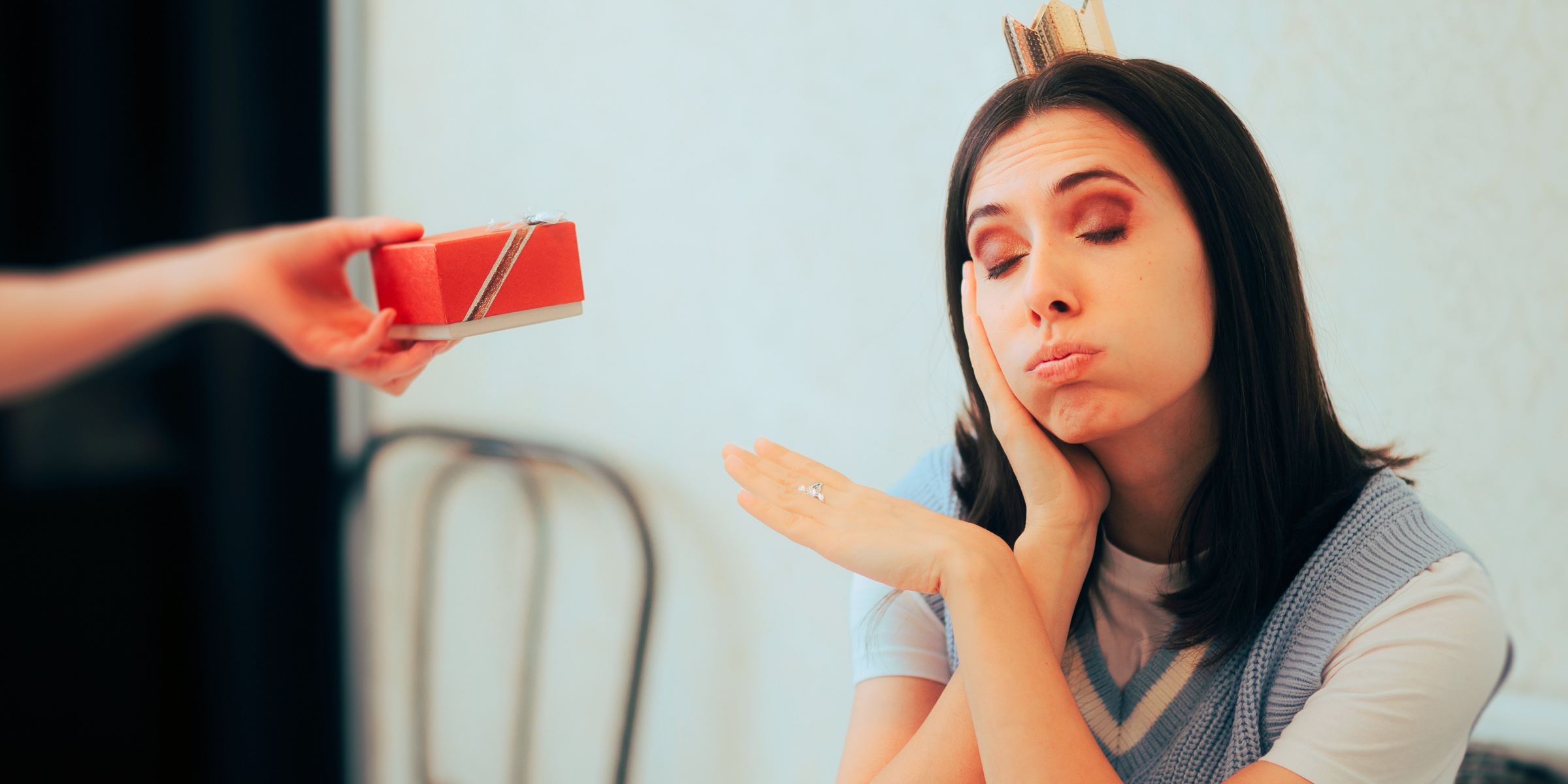 A woman refusing a gift | Source: Shutterstock