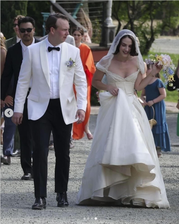 Kevin McEnroe and Fern Cozine are pictured at their wedding in a post shared on June 15, 2025. | Source: Instagram/people