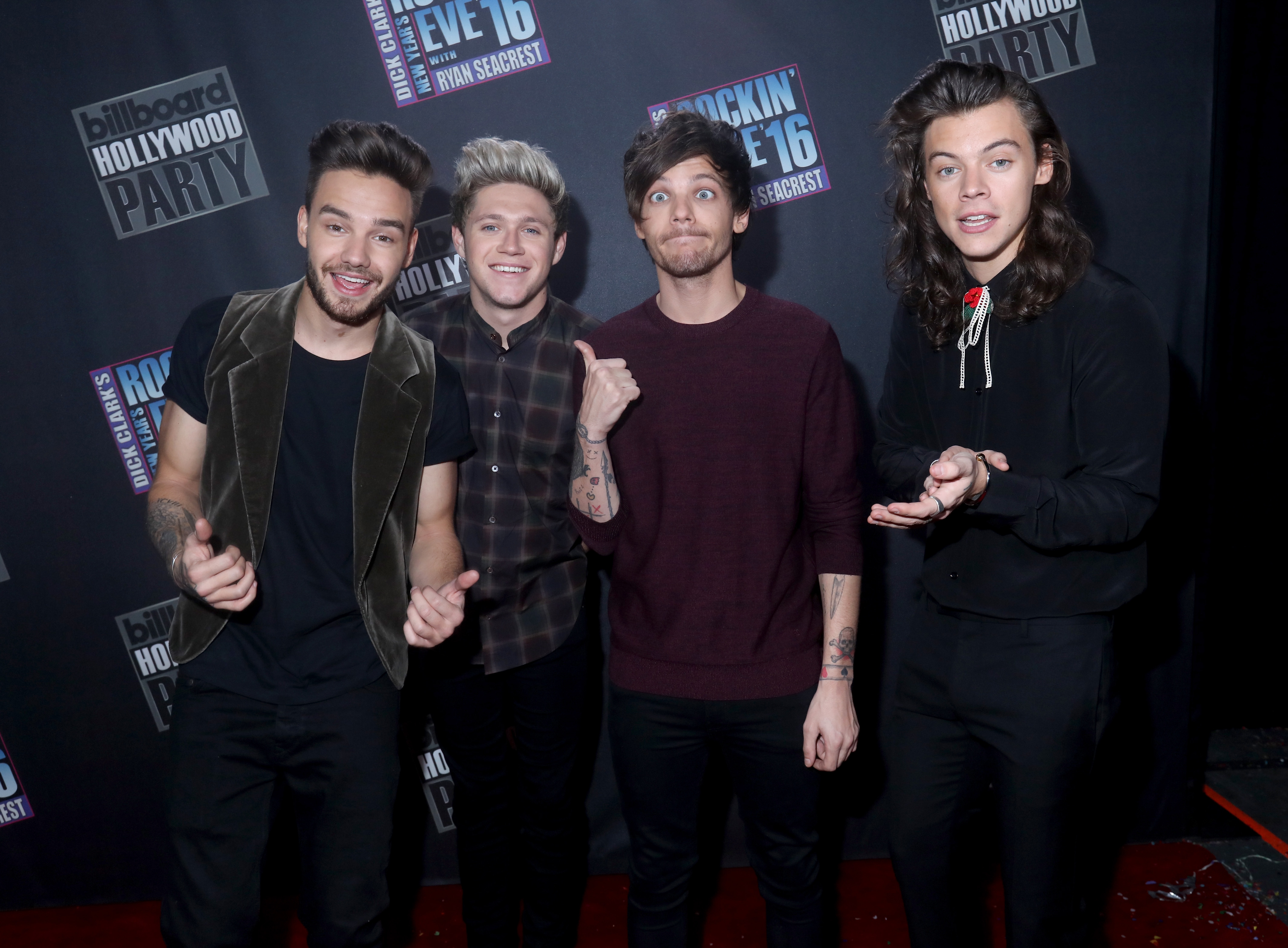 Liam Payne, Niall Horan, Louis Tomlinson and Harry Styles of One Direction attend Dick Clark's New Year's Rockin' Eve with Ryan Seacrest 2016 on December 31, 2015 in Los Angeles, California. | Source: Getty Images