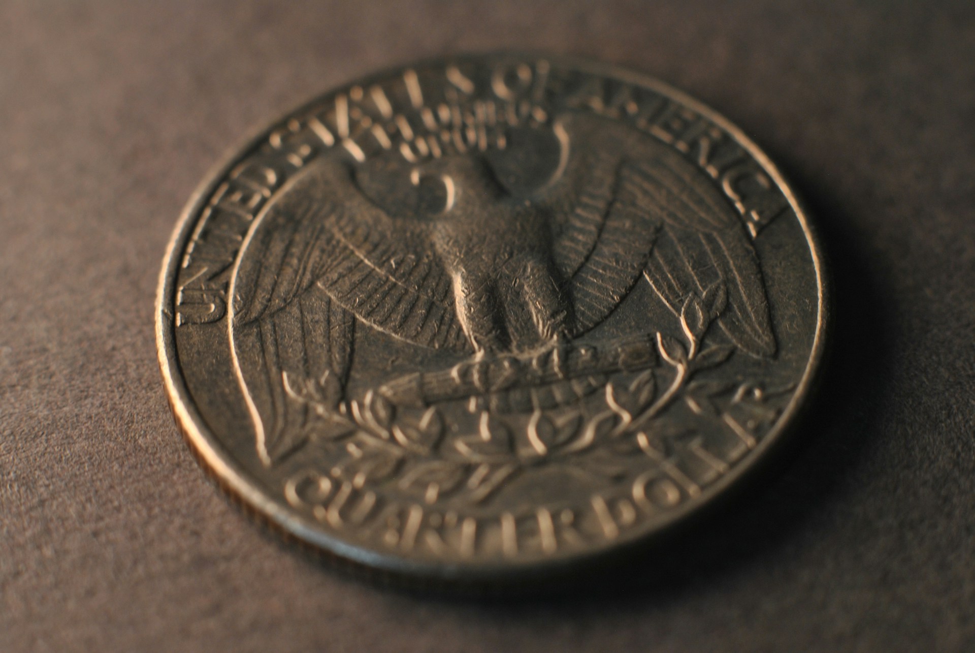 A coin on a table | Source: Unsplash