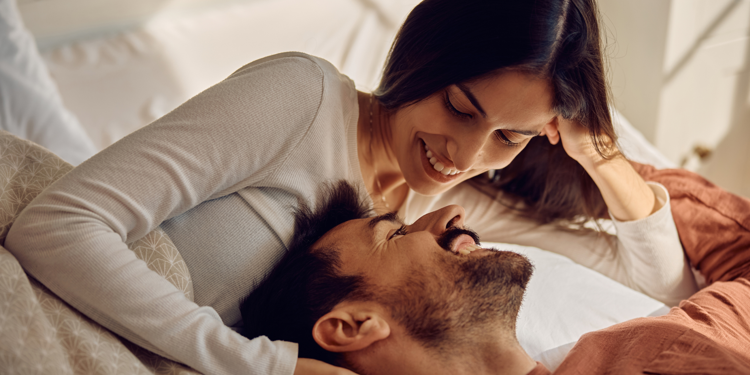 A couple smiling at each other | Source: Pexels