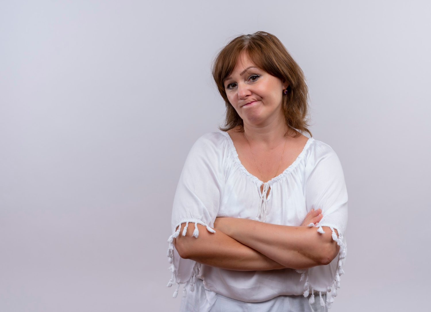 A displeased middle-aged woman | Source: Freepik