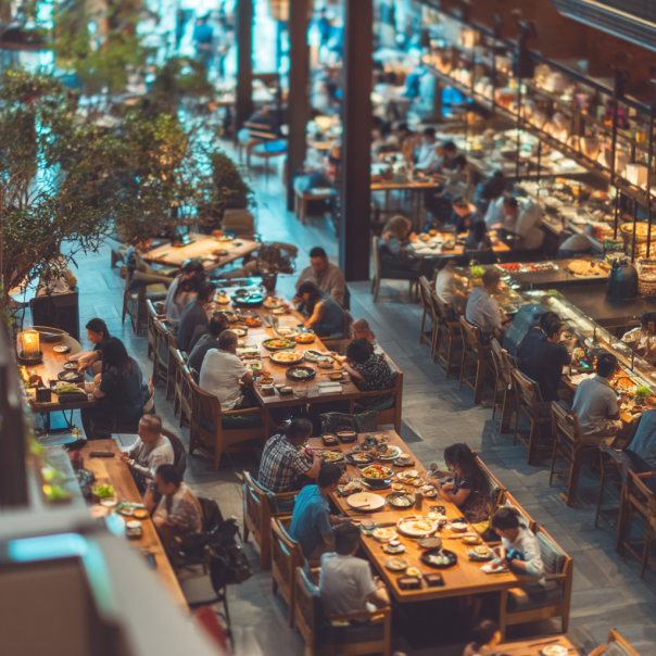 People enjoying their meals at a restaurant | Source: Midjourney