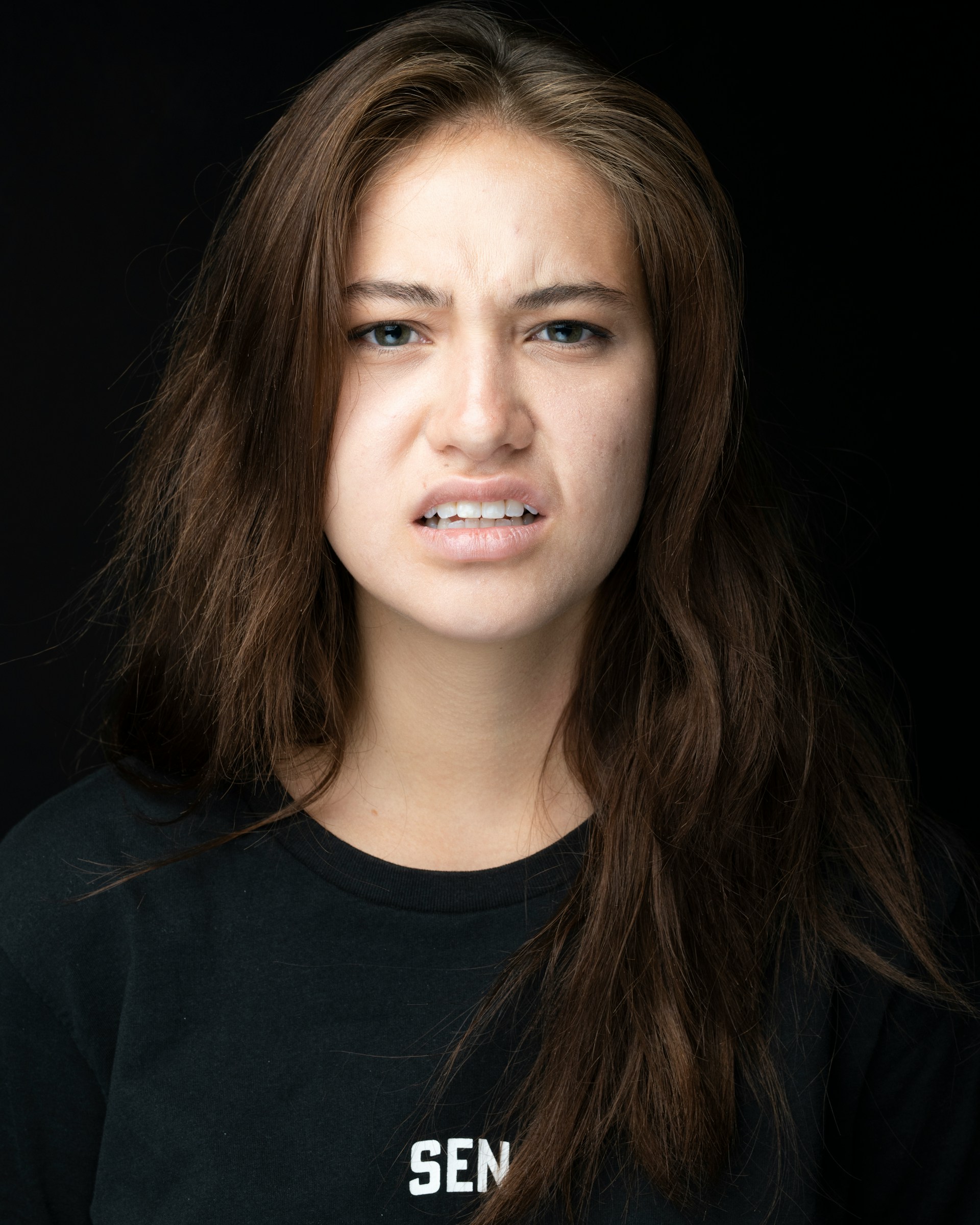 A woman looking at something with disgust | Source: Unsplash