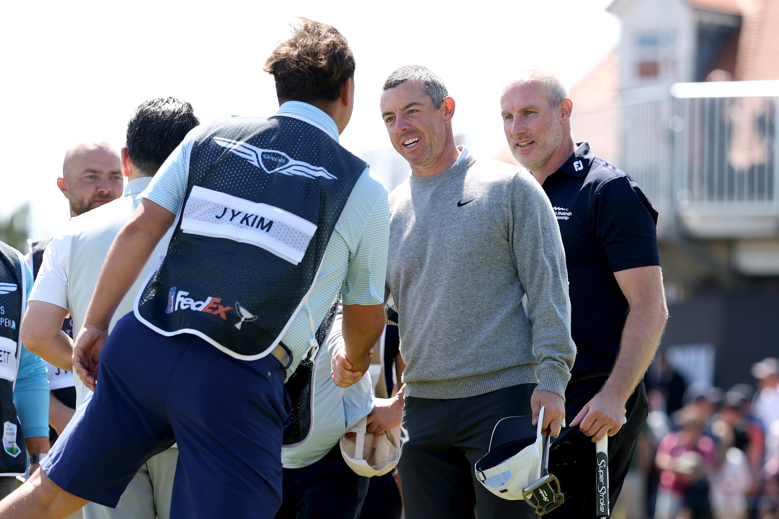 Rory McIlroy shakes hands with his group following their round during the pro-am prior to the Genesis Scottish Open 2025 at The Renaissance Club on July 09, 2025 in North Berwick, Scotland. | Source: Getty Images