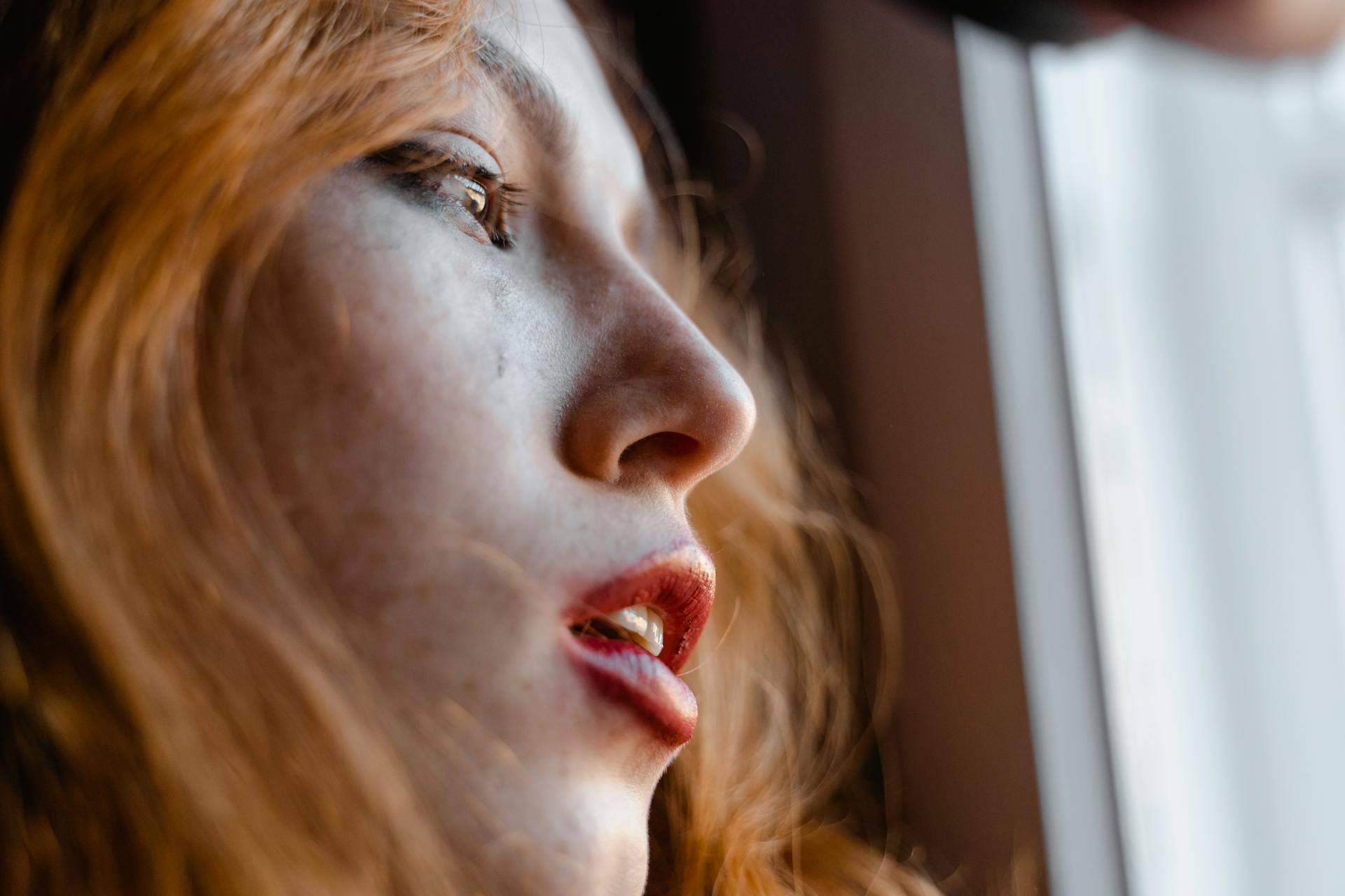 A close up of an emotional woman's face | Source: Pexels