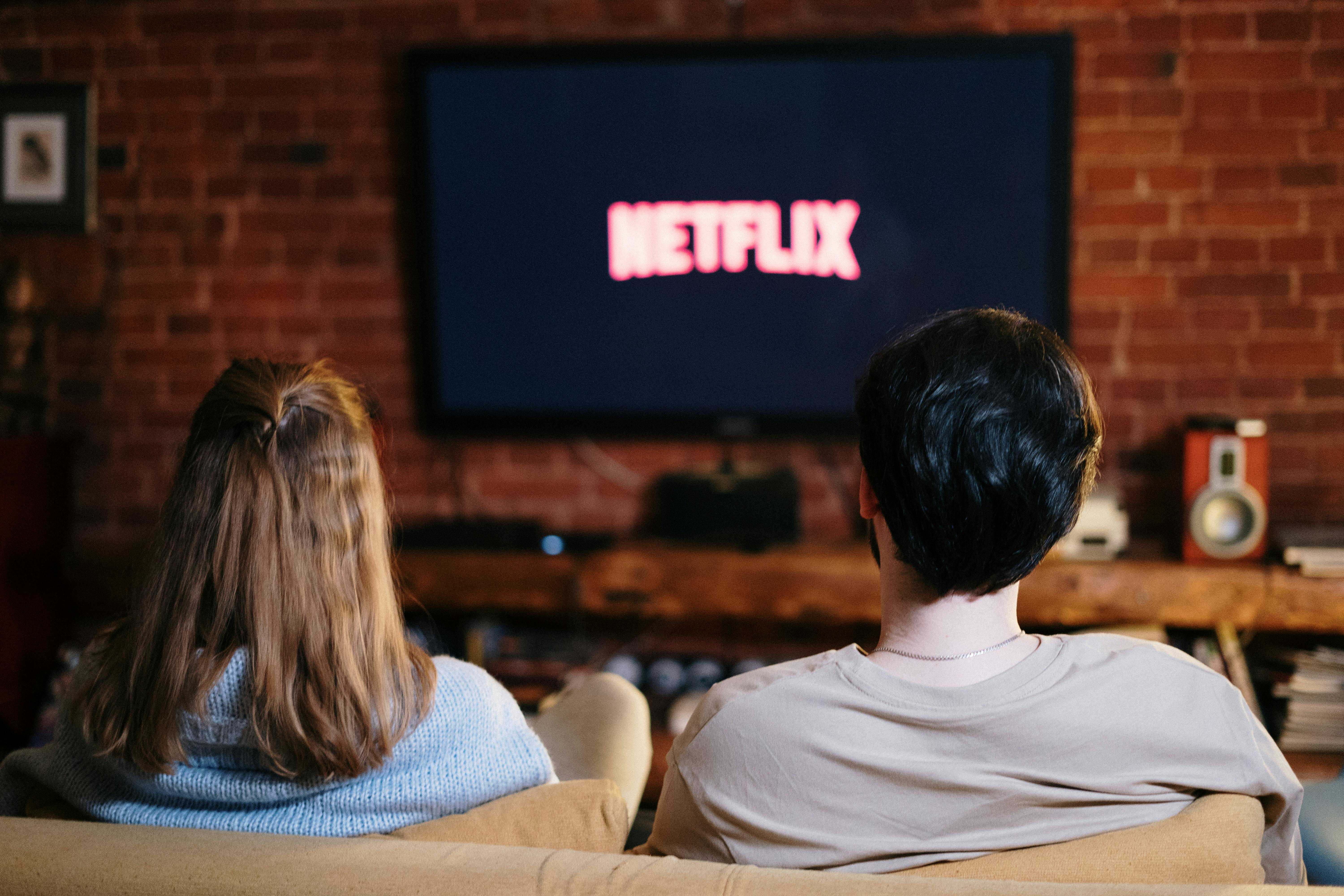 A couple watching TV together | Source: Pexels