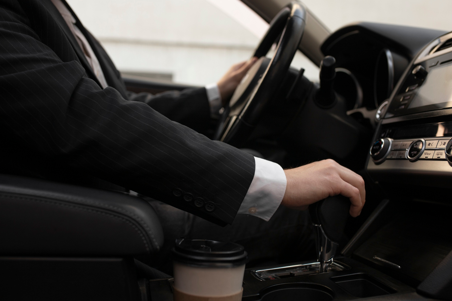 A man sitting in the car | Source: Freepik