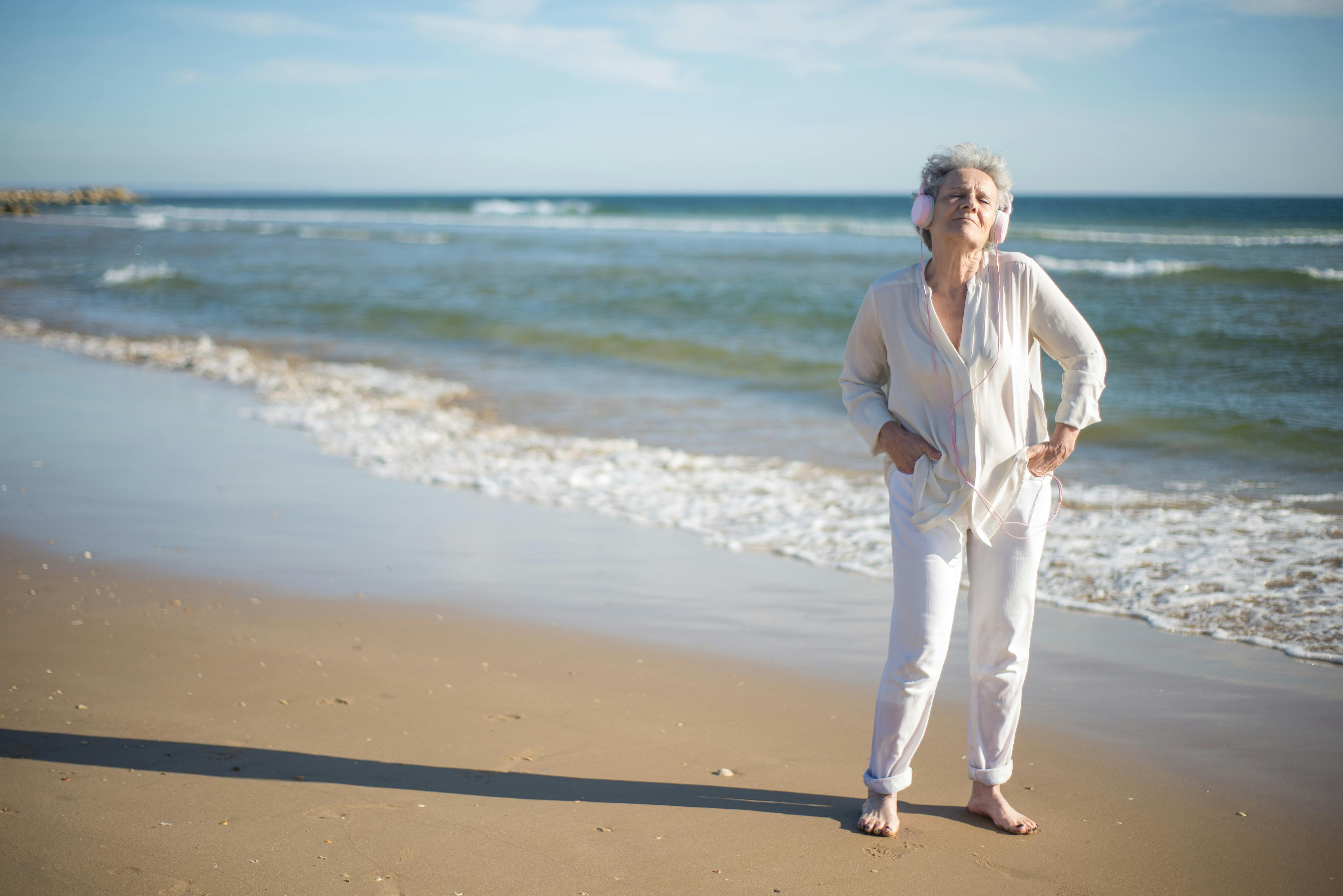 An older woman at the beach | Source: Pexels